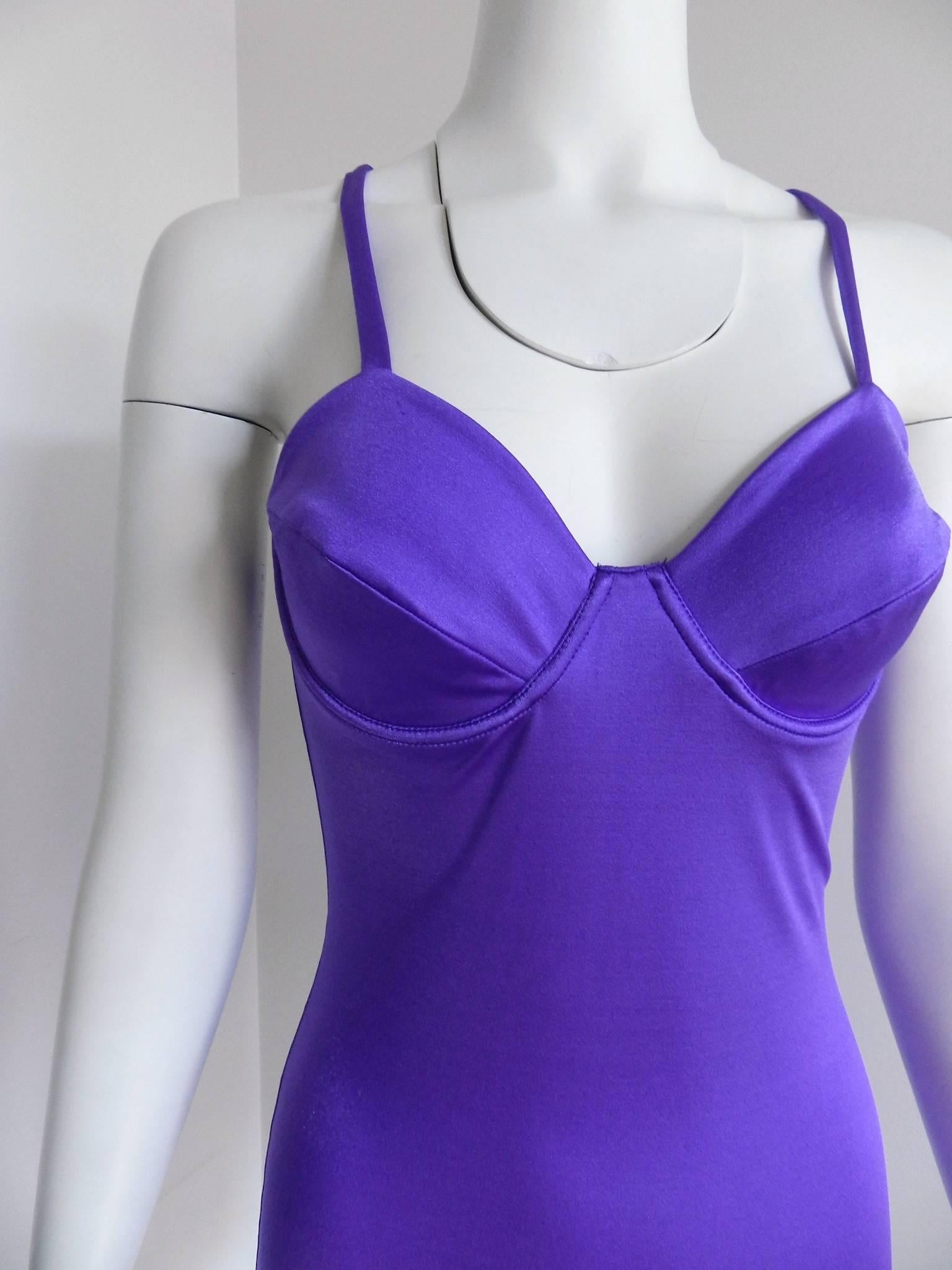 Versus by Gianni Versace Vintage Spring 1994 Electric purple Bodycon Dress.  Stretch spandex pull-over tube dress with sheen and under wired bra. Tag dated Spring 1994 collection. Excellent vintage condition. Tagged size IT 42 (USA 6). Can fit USA 4