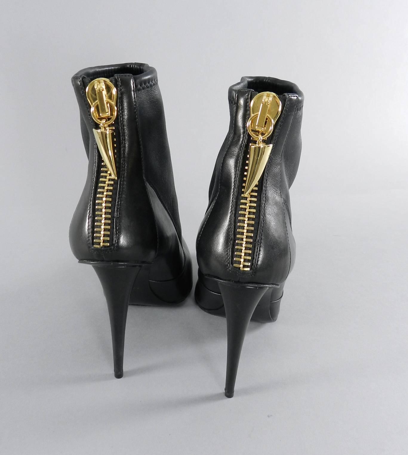 black boots gold zipper