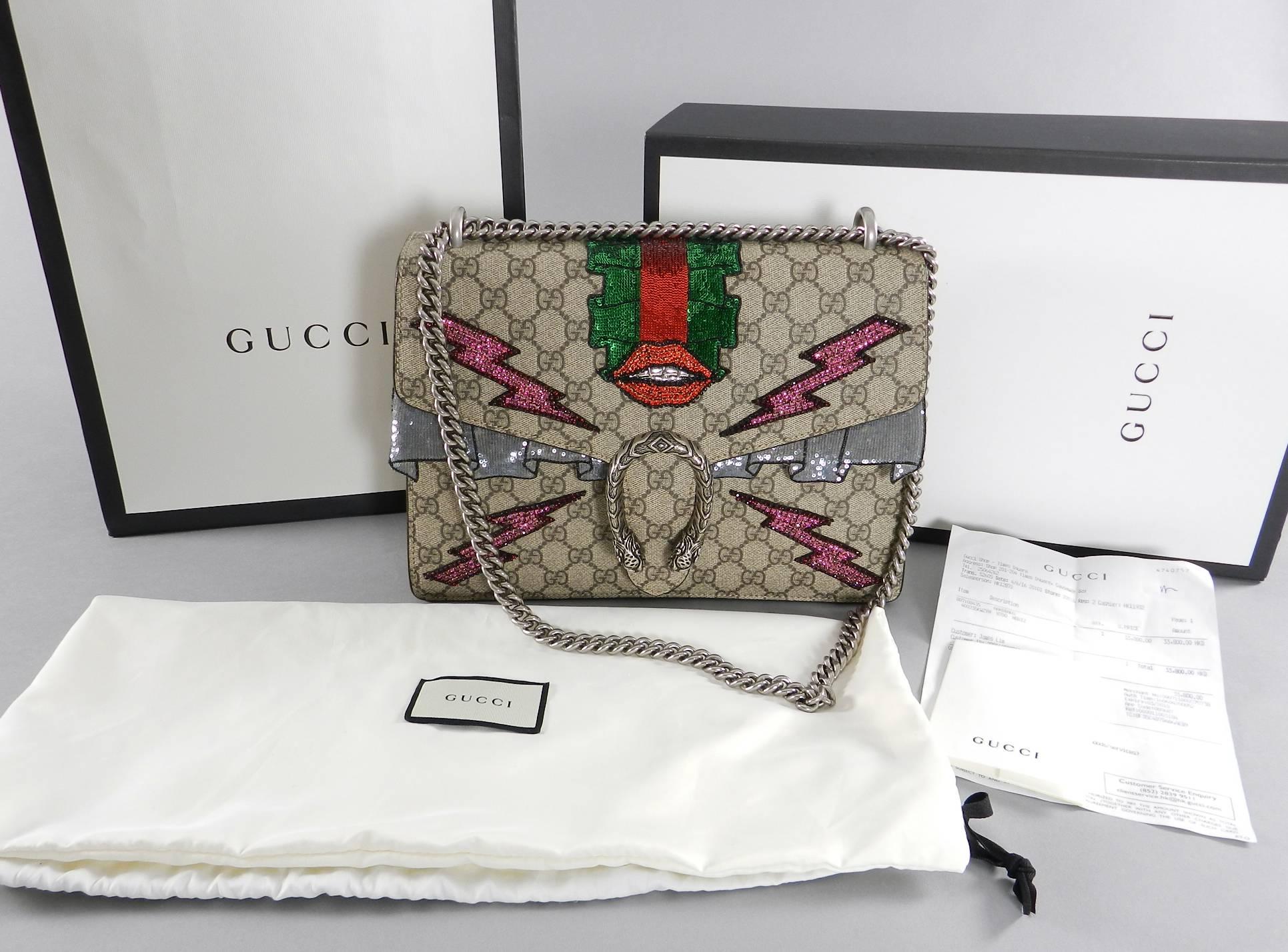 Gucci Dionysus GG supreme embroidered bag.  Excellent clean pre-owned condition with all jewels intact. Carried only a few times. Includes original box, duster, and sales receipt.  Body of bag measures about 11.5 x 8.25 x 3.25