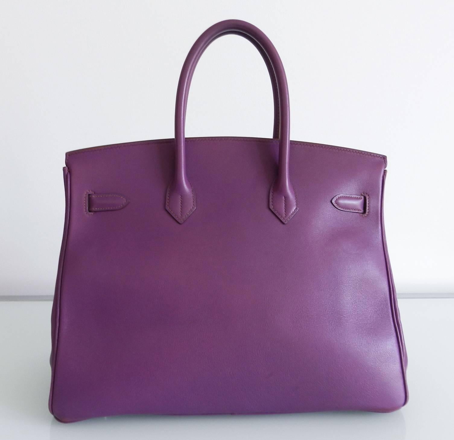 Hermes "ultraviolet" purple birkin 35cm in swift leather and palladium hardware. Date stamp E in square for year 2001.  Excellent pre-owned condition. The smooth swift leather has been refurbished at Hermes Paris. Includes duster,
