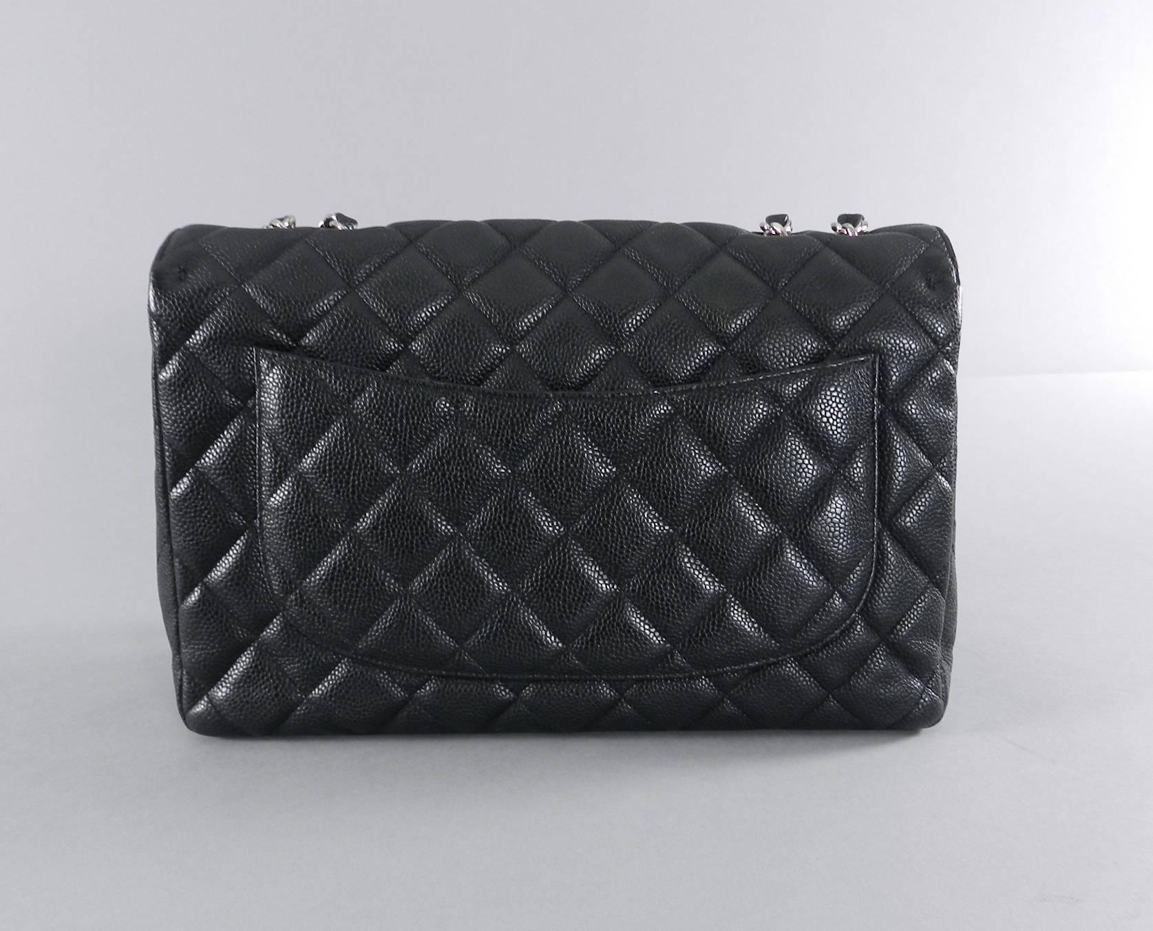 Black Chanel Caviar single flap Jumbo Classic Flap Bag with silver hardware 