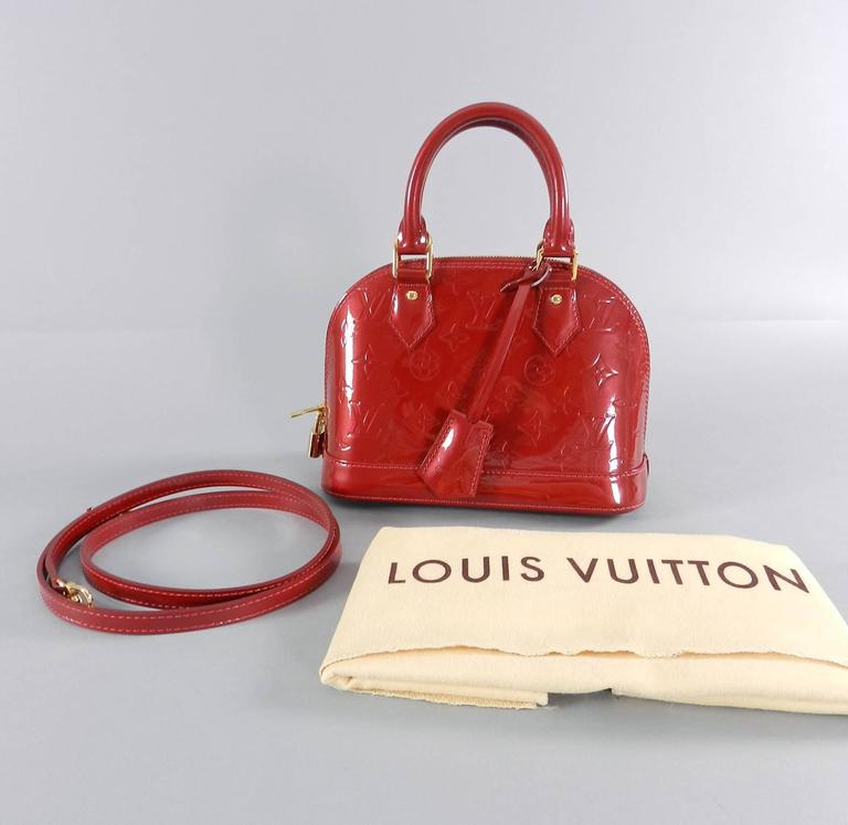 Louis Vuitton authentic used Mini Alma BB crossbody silver mirror