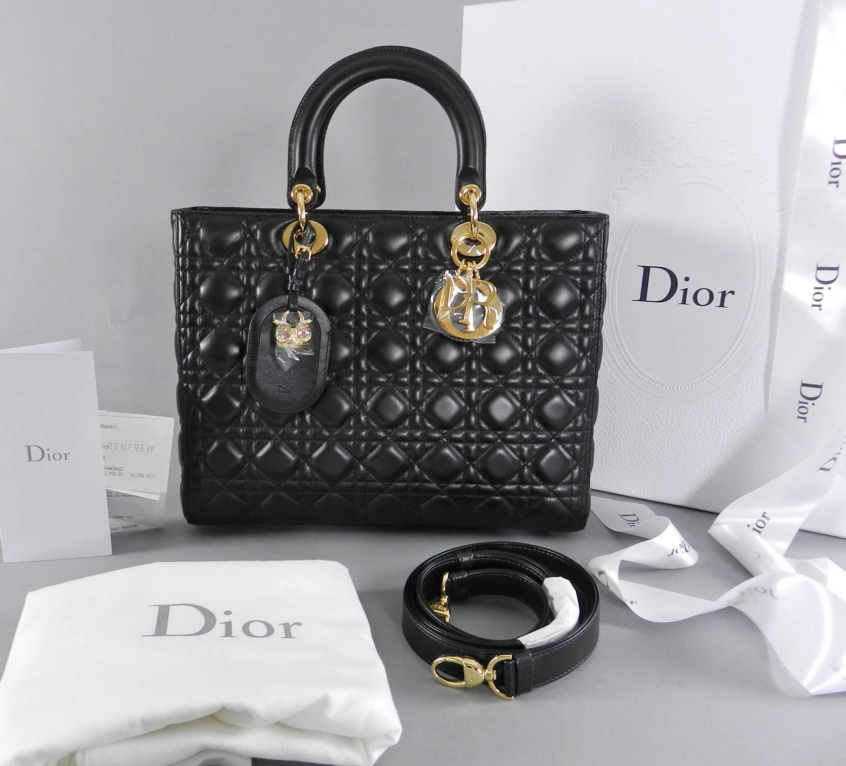 Christian DIOR Lady Dior black lambskin leather tote in size large.  This also includes a Dior jewelled owl bag charm. Brand new never used and with sales receipt from current season. Comes with all papers, duster, box, ribbon, catalogue,