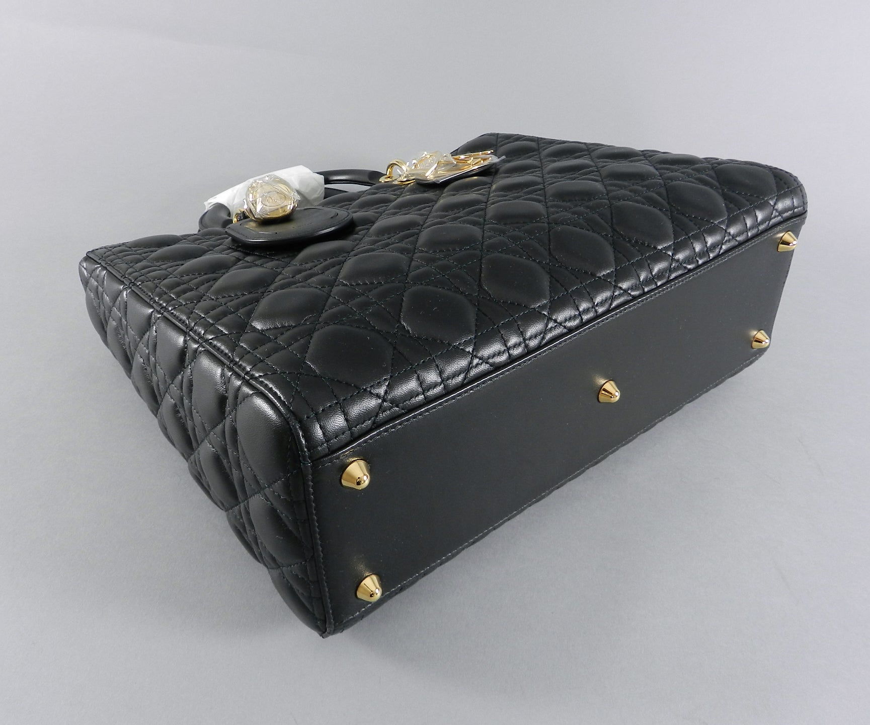 Download Lady Dior Pouch Black Background