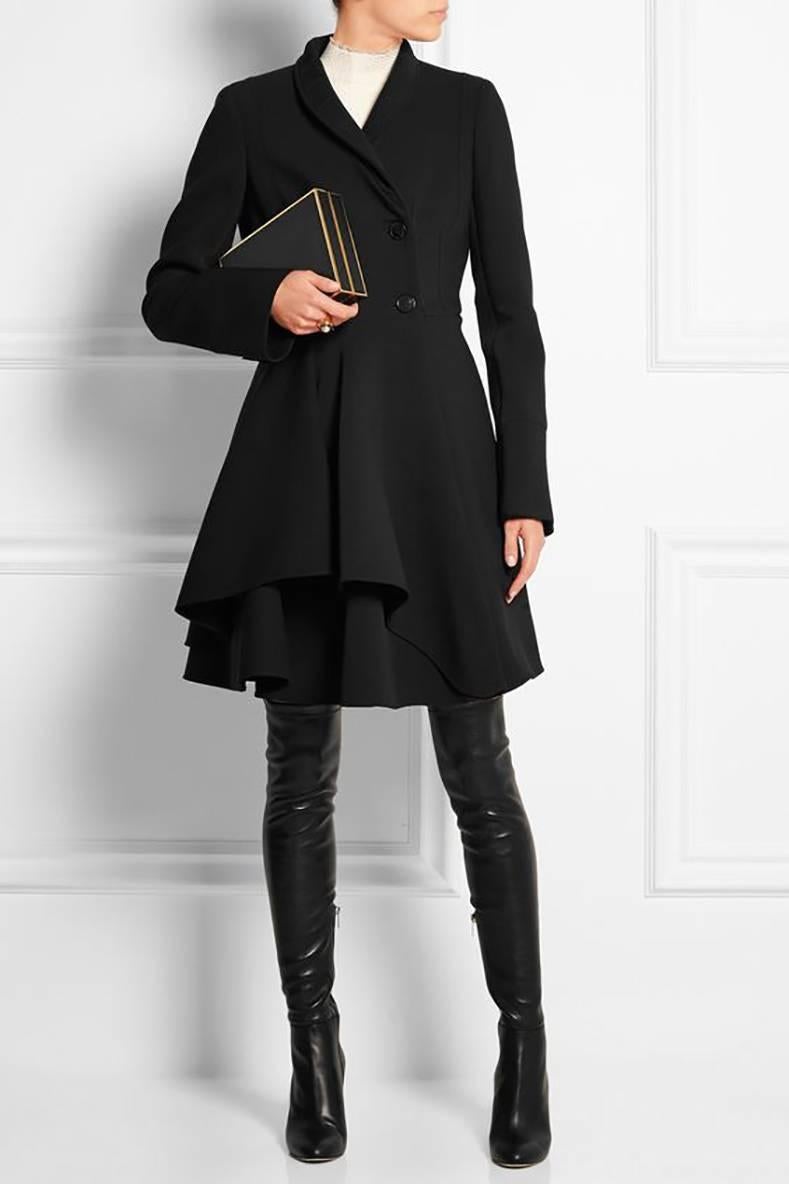 Alexander McQueen Black Scuba Coat with Asymetrical Ruffle.  Pre-fall 2015. Original retail $4000+ . Princess Cut, double breasted, top stitch detail, 2 side hip pockets. Unlined body but lined at upper interior.  Excellent pre-owned condition -