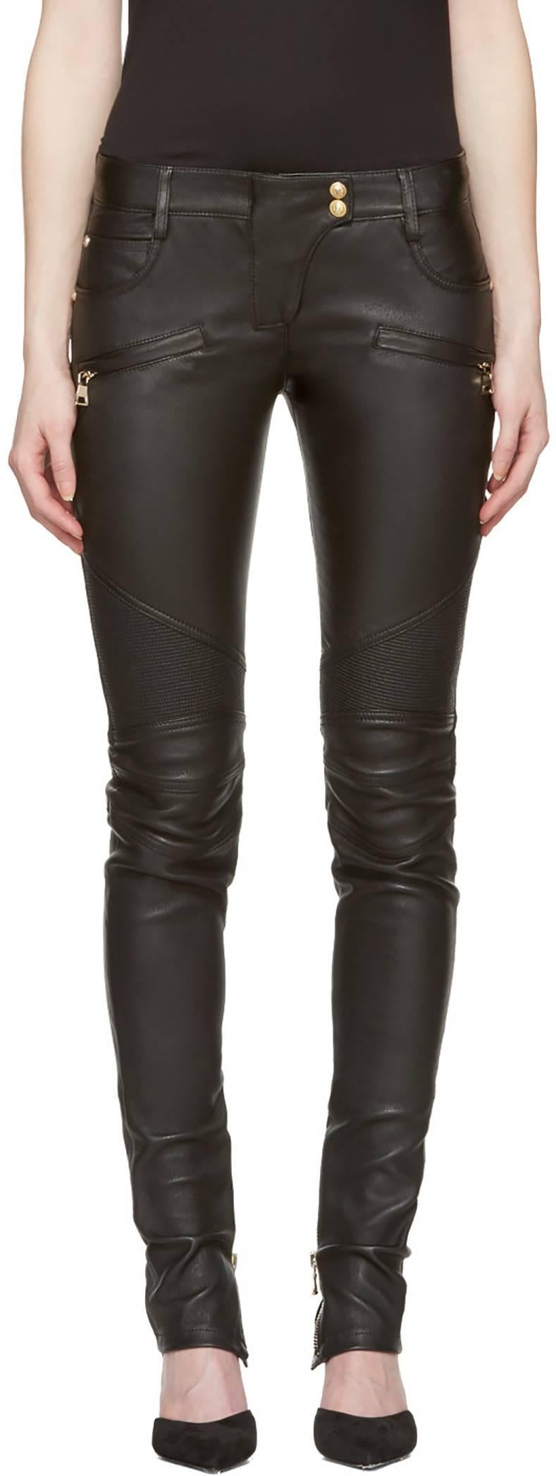 Balmain Black Leather Biker Motorcycle Skinny Jeans / Pants.  This style is still in stores selling for $3100+. Size FR 36 (USA 4). Gold metal ankle zips, ridged knees, gold lion head snaps.  Excellent pre-owned condition - worn once if at all -