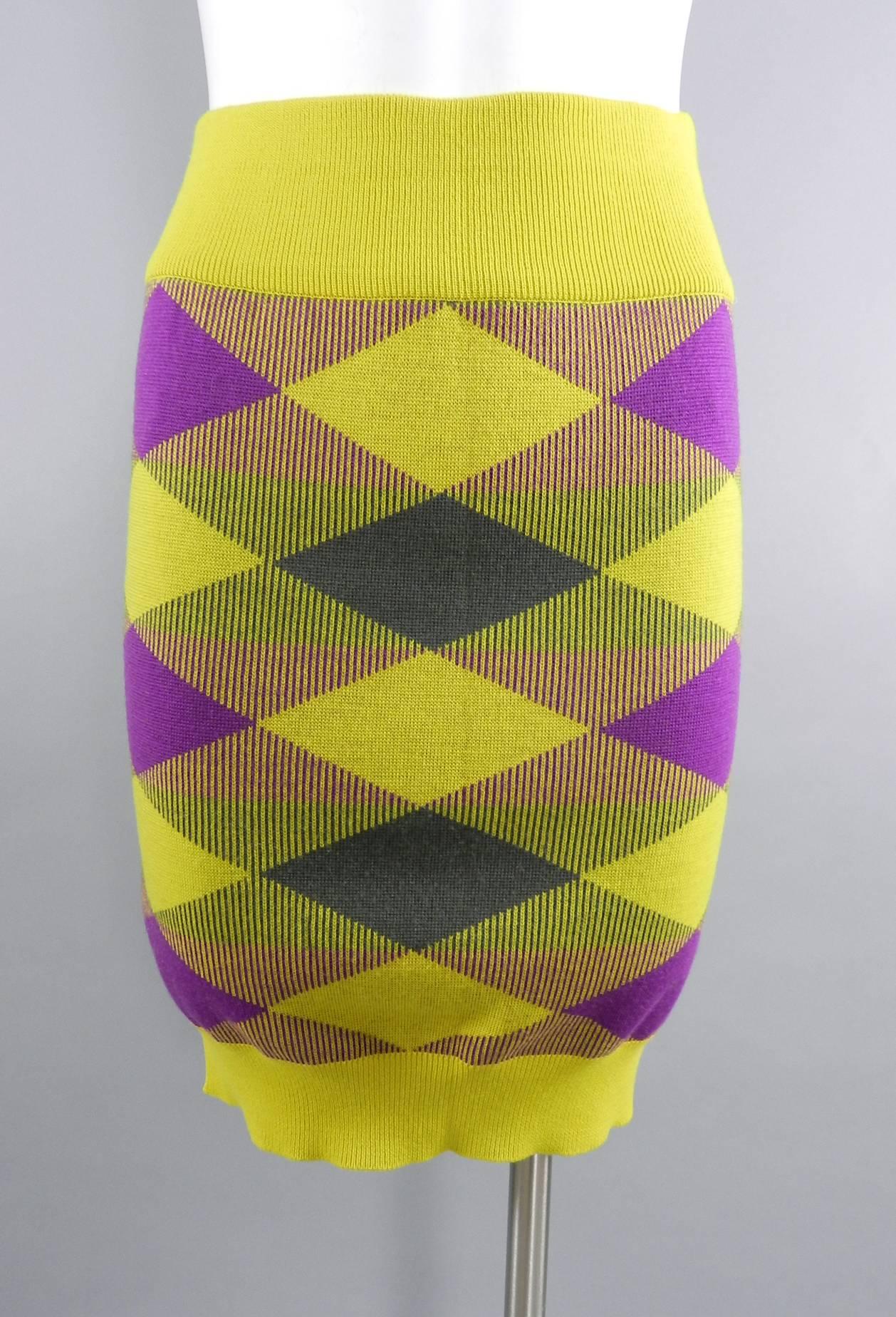 Issey Miyake vintage 1980s Yellow and Purple Sweater and Skirt Set.  Stretchy knit tube skirt with ribbed waist and hem and asymmetrical neckline on sweater. Tagged size M (approximate USA 6/8). Stretchy but recommended for about 26-30" waist,