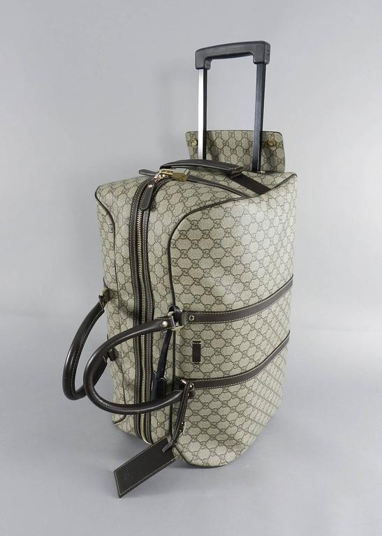 Gucci GG monogram Brown Canvas Duffle Rolling Luggage Carry on Travel Bag at 1stdibs