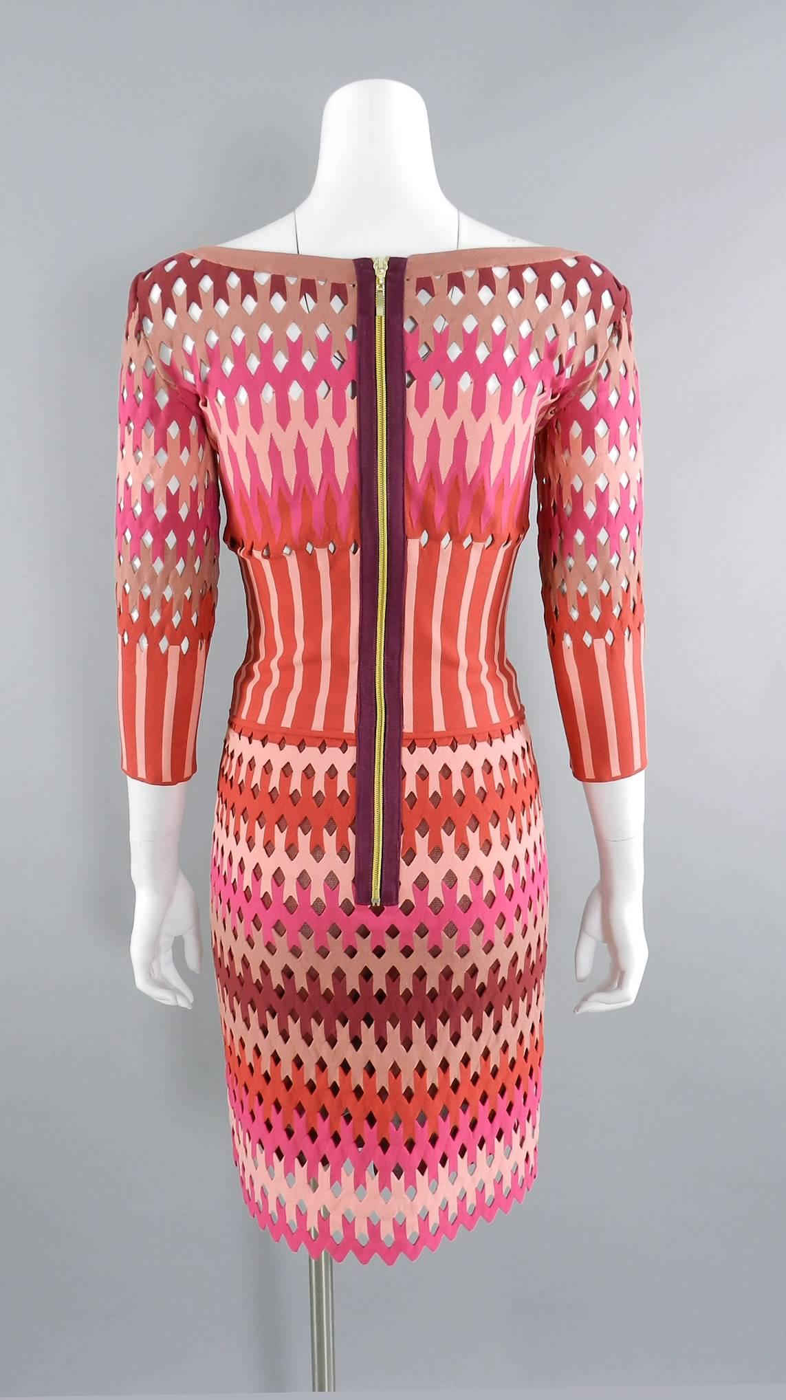 ALAIA red and pink cut out diamonds bodycon stretch dress.  Gold centre back zipper, 3/4 length sleeves, fitted silhouette. Size small (USA 4/6). To fit 34/35" bust person, about 27" waist, 36" hip, 15.5" shoulder seams, 17"