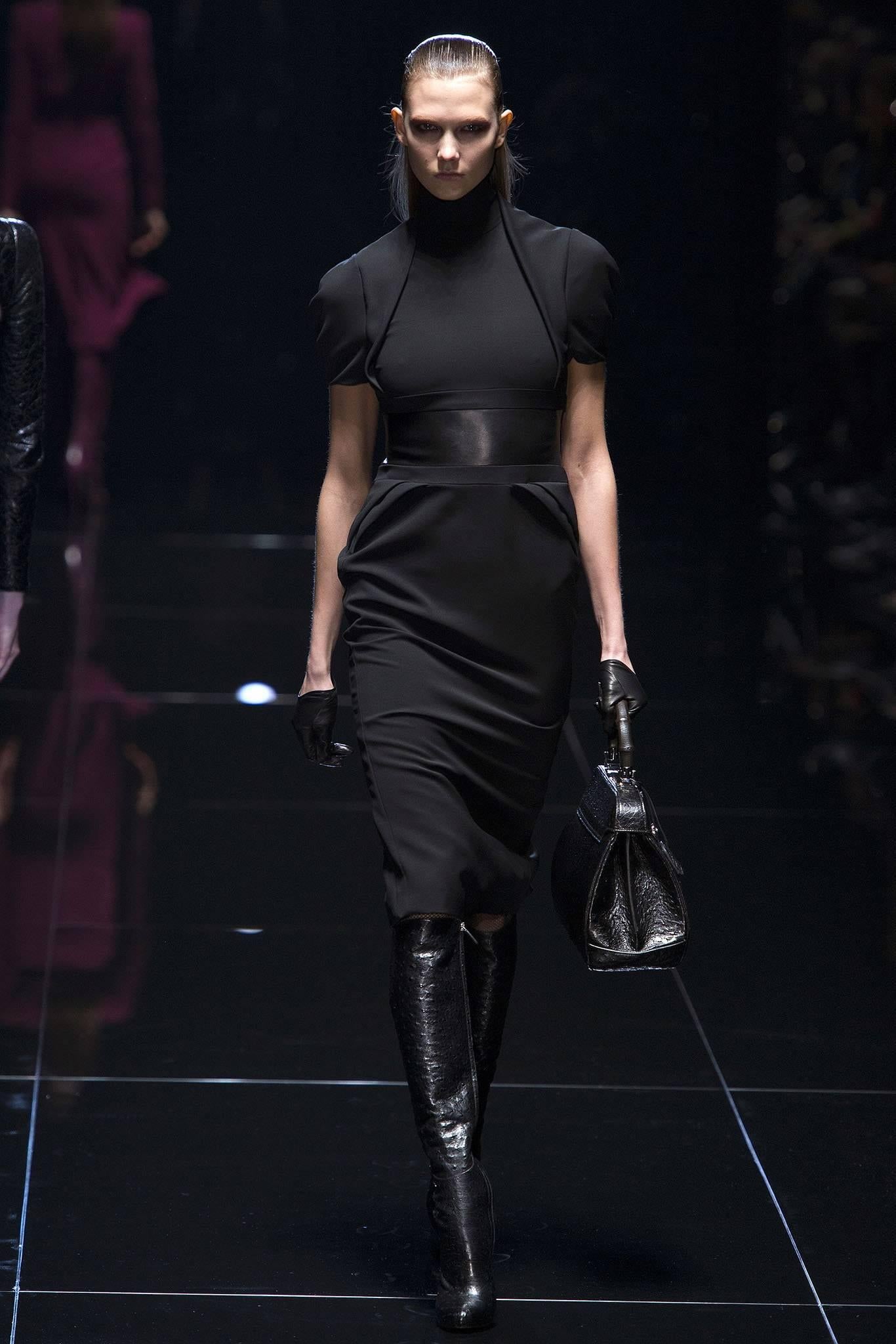 Gucci Fall 2013 runway Black Dress with Leather Waist.  Tagged size IT 42 USA 6.  To fit 34" at bust, 29" maximum waist, 37/38" hip. Shoulder seams 14", sleeve 8", back neck seam to hem 41".  79% rayon, 19 wool, 2