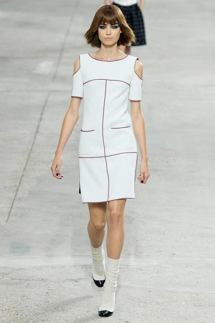 Chanel 2014 spring runway collection dress.  Cut out shoulder design, light dove grey color that almost reads white, trimmed with multicolor piping. Centre back zipper, straight cut body, front hip pockets.  Size FR 38 (USA 6). To fit 34