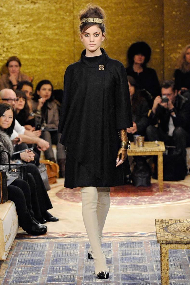 Chanel 11A - 2011 pre-fall Byzantine Runway Black Cape Coat.  Chanel look number 2 on the runway collection. Excellent strong clean condition - worn once.  Fastens with hidden closures at front and is decorated with a large square burgundy and black