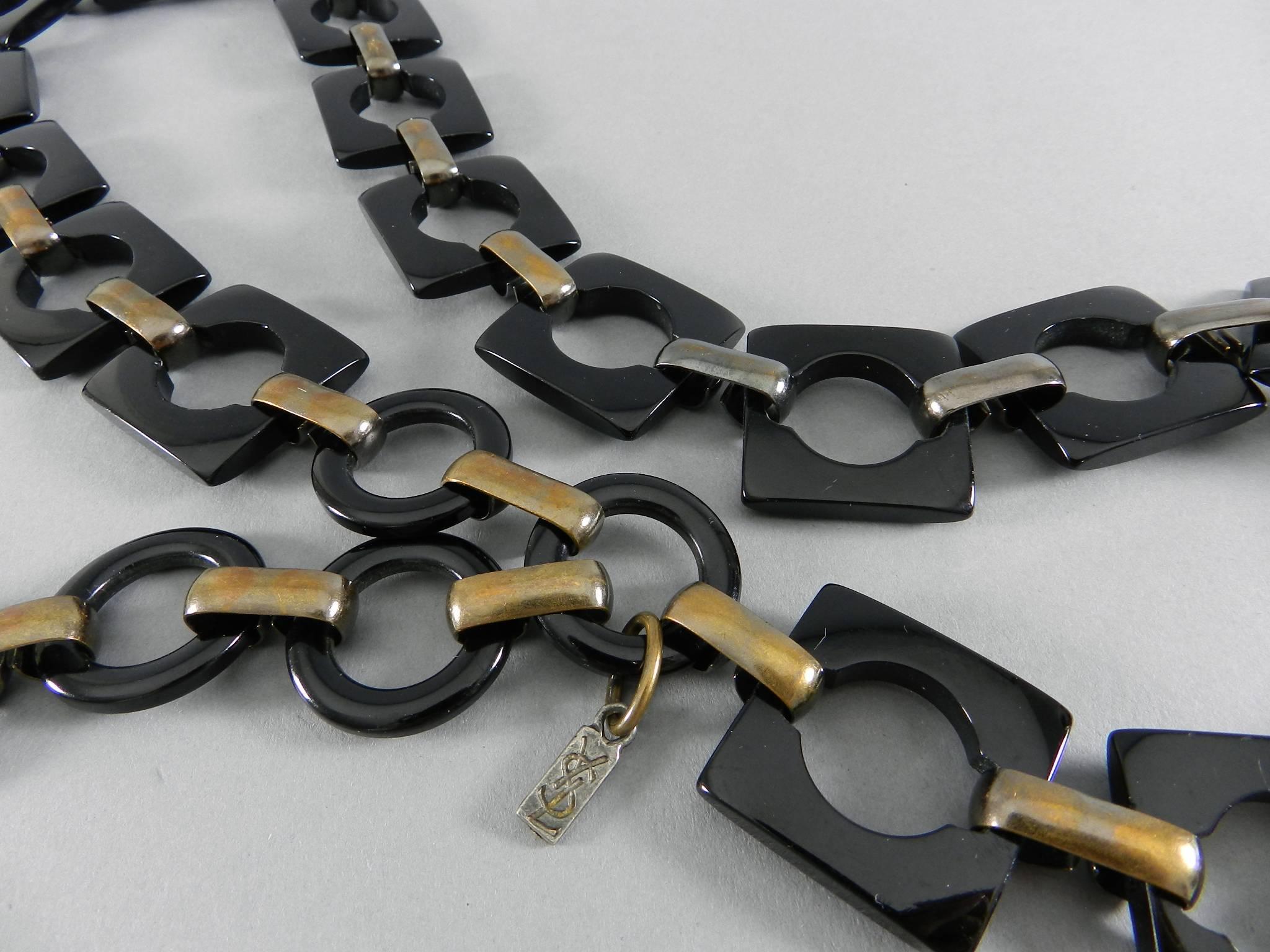 Vintage 1970's Yves Saint Laurent plastic link belt.  Hook closure can fasten on extender rings between 31-36