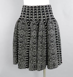 Alaia Black and White Knit Jersey Peplum Top and Flare Skirt Set
