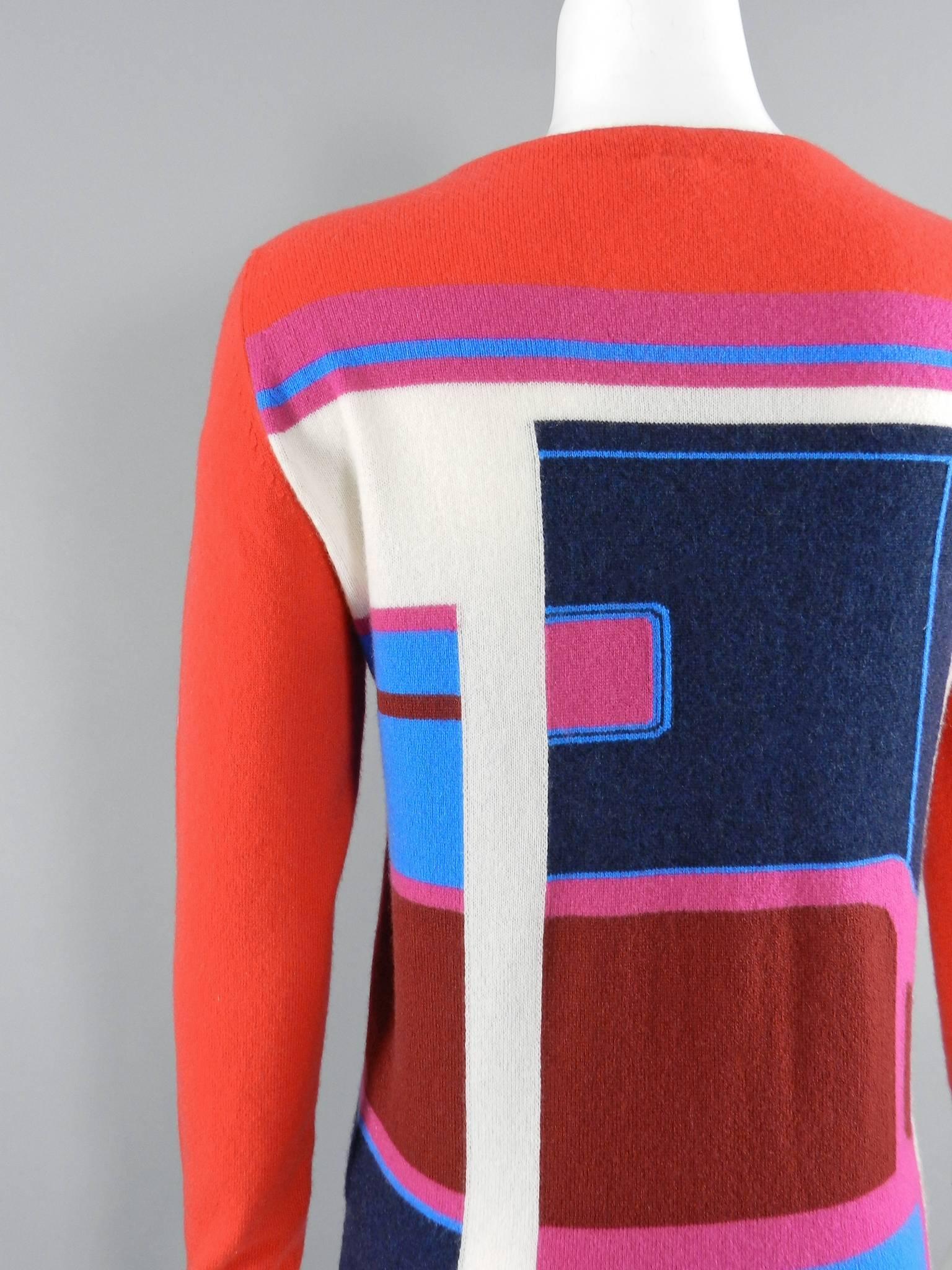 Hermes Red and Blue Color Block Cashmere Sweater.  Graphic design in melon red, blue, navy, burgundy, white, and pink  Tagged FR 36 (USA 4).  To fit 34