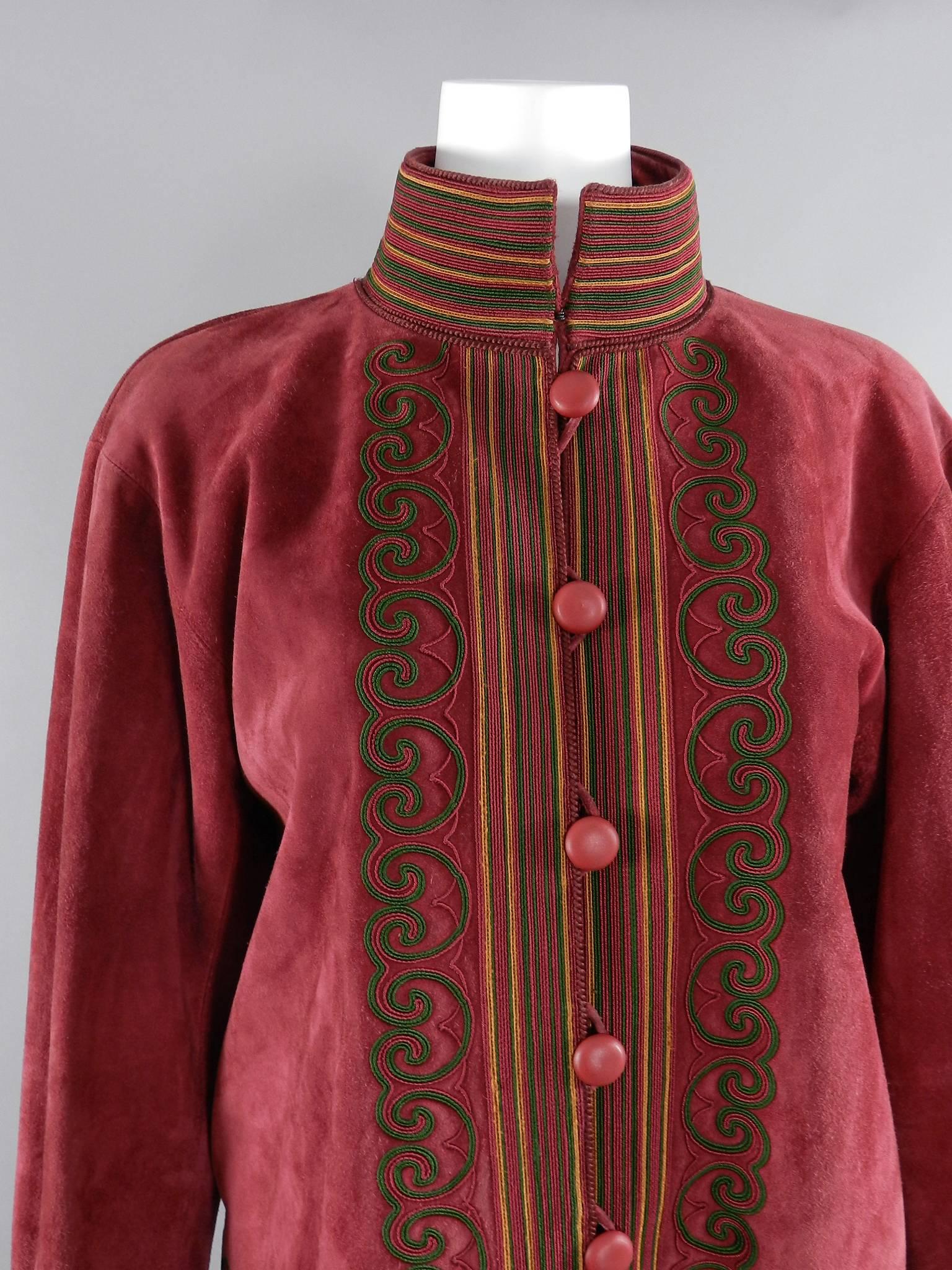 Yves Saint Laurent Vintage 1970's Burgundy Suede Soutache Trim Jacket.  Stand up collar, straight cut body, buttons down centre front.  Tagged size FR 40 (USA 8).  To fit 36" bust, 16" shoulder seam, 24" sleeve.  Excellent