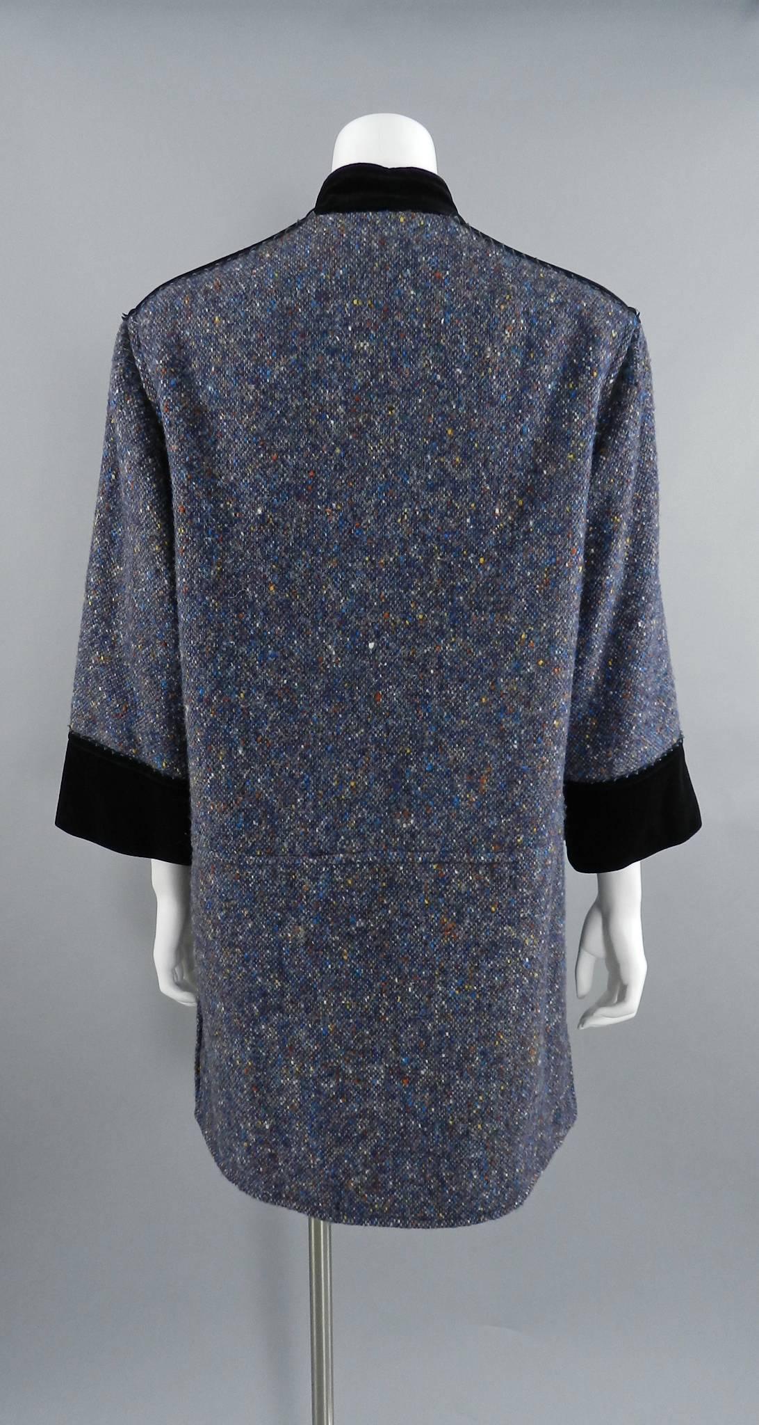 Nina Ricci boutique vintage 1970's tweed wool and velvet coat.  Purple and blue tone flecked wool body, straight-cut design, velvet and leather trim, and double row of buttons. Tagged size FR 36 (USA 4 / 6).  Garment bust measures 40