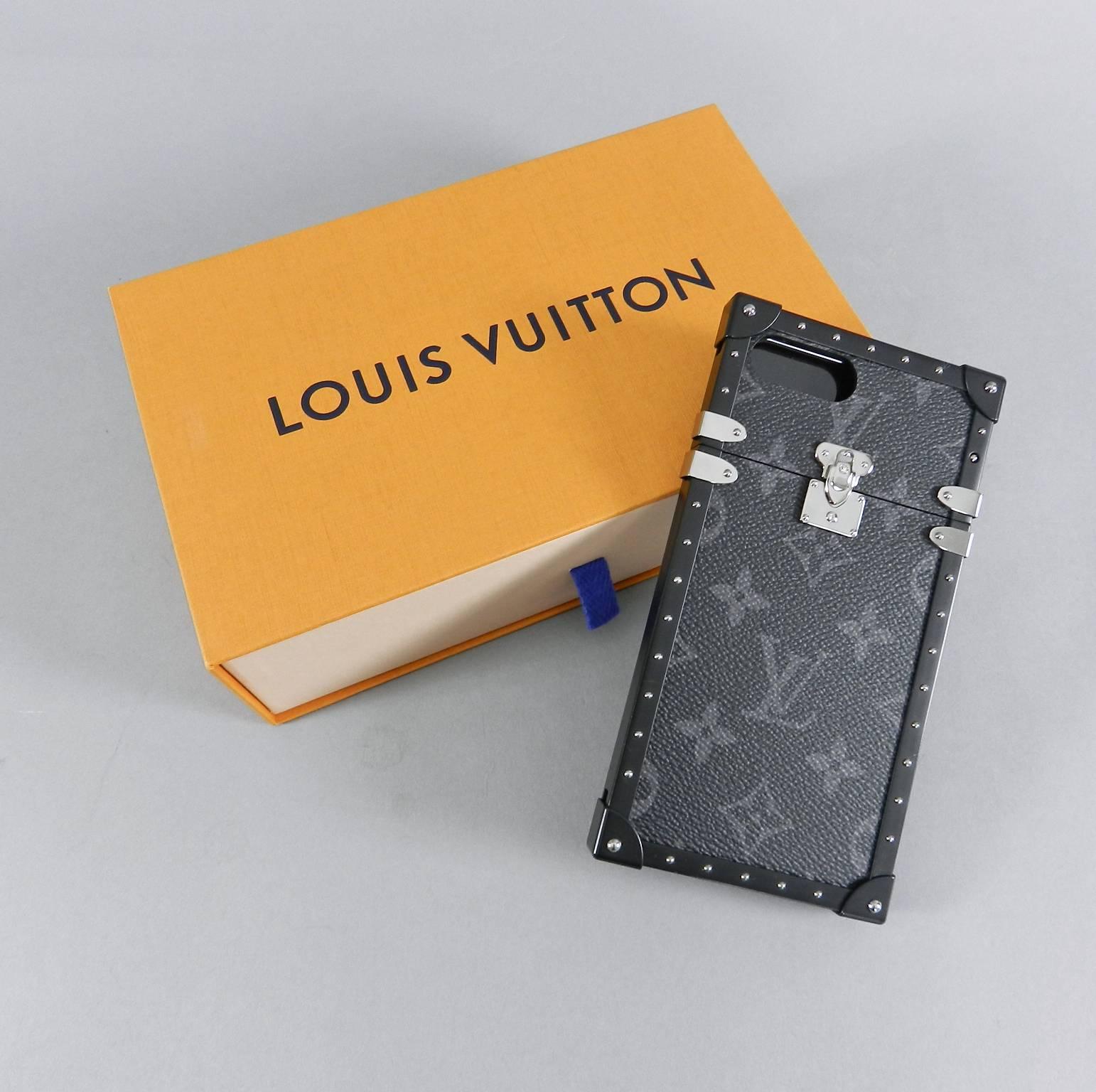 Louis Vuitton Iphone 7+ Eye Trunk Case Monogram Eclipse.  Current season and sold out. Includes all packaging and original purchase receipt. Was used only briefly.  Shows some fine scratching on front plastic face that is visible from some angles