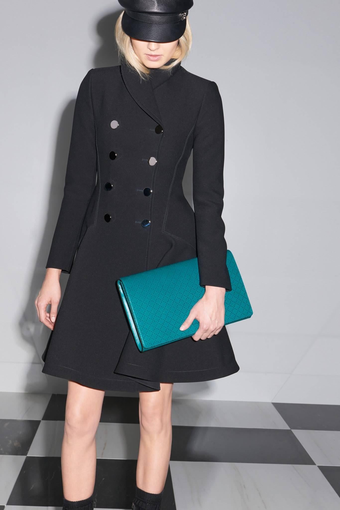 Gucci pre-fall 2014 Black Dress coat with Silver Buttons.  Rounded collar, double row of shiny silver metal buttons, seamed design, flared hem.  Fall weight dress coat and not a heavy winter weight. Tagged size IT 40 (USA 2/4).  Garment bust