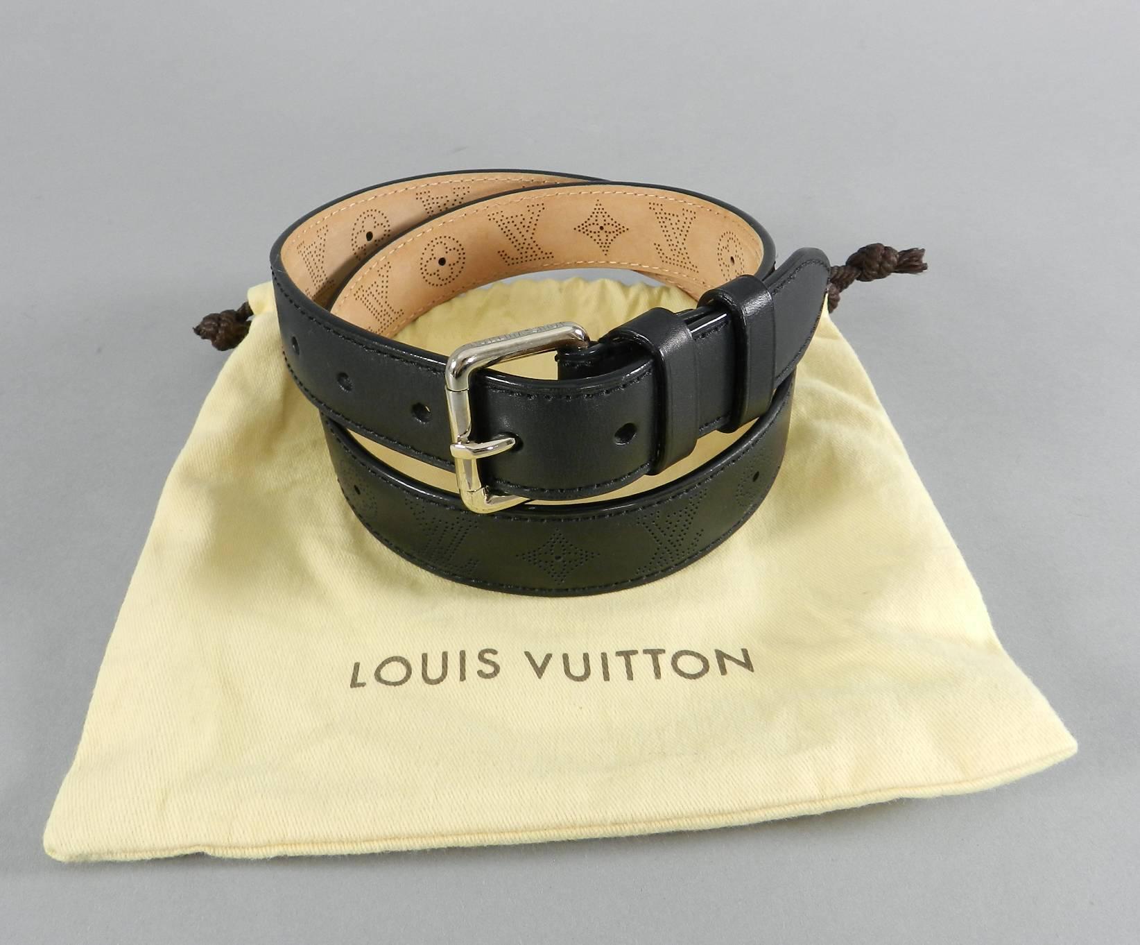 Louis Vuitton Black Perforated Monogram Mahina Leather Belt.  Holes every inch from 31-35".  Measures 1-1/8" wide. Excellent pre-owned condition. Looks to be worn only once. Includes duster.

We ship worldwide.