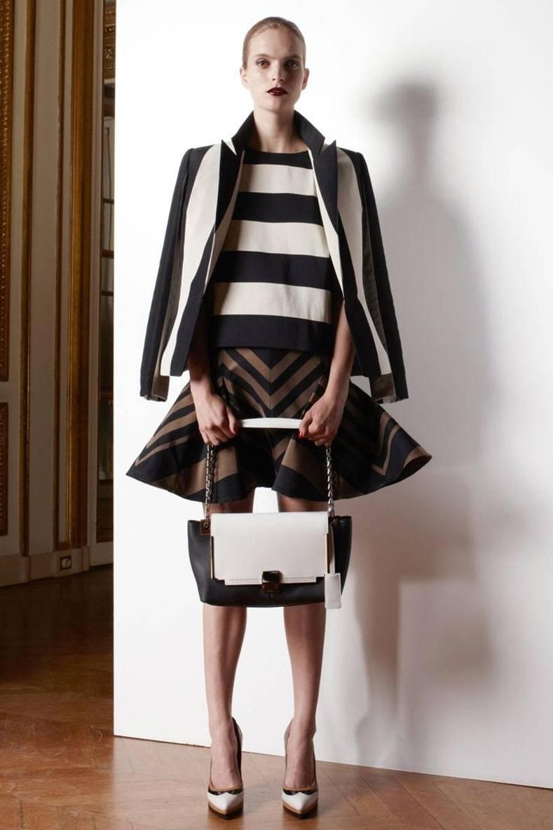 Lanvin resort 2013 black and ivory striped blazer. New with tags and unworn.  Vertical stripes, notched collar, fastens at front waist with hook and eye closure. Color is black and ivory / light beige / ecru.  65% cotton, 33 poly, 100% silk lined. 