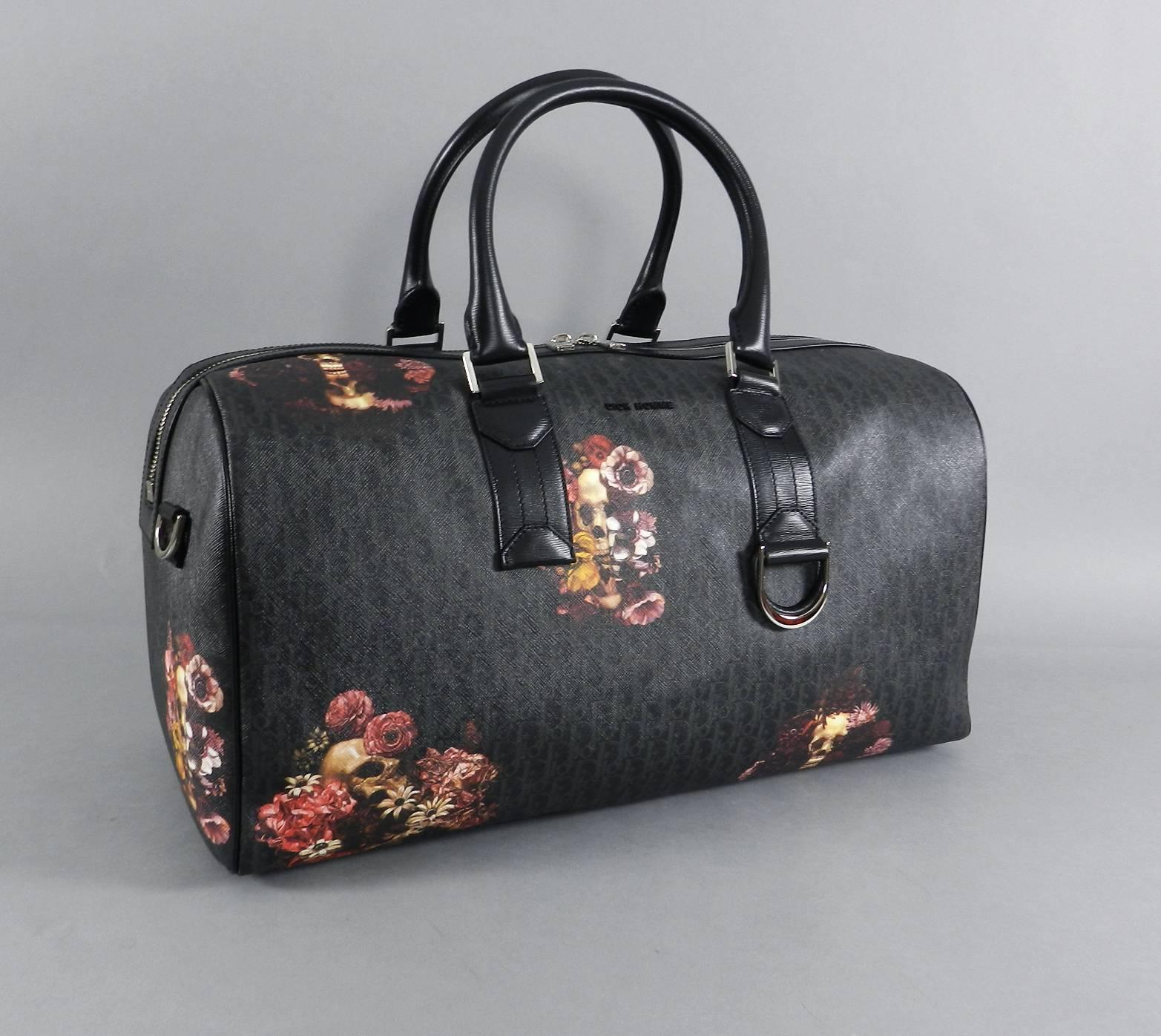 Dior homme men's travel duffle bag from Spring / Summer 2017 collection.  Limited edition collaboration with Japanese artist Toru Kamei.  Signature monogram coated canvas with floral momento mori skull design.  New without tags.  Includes removable