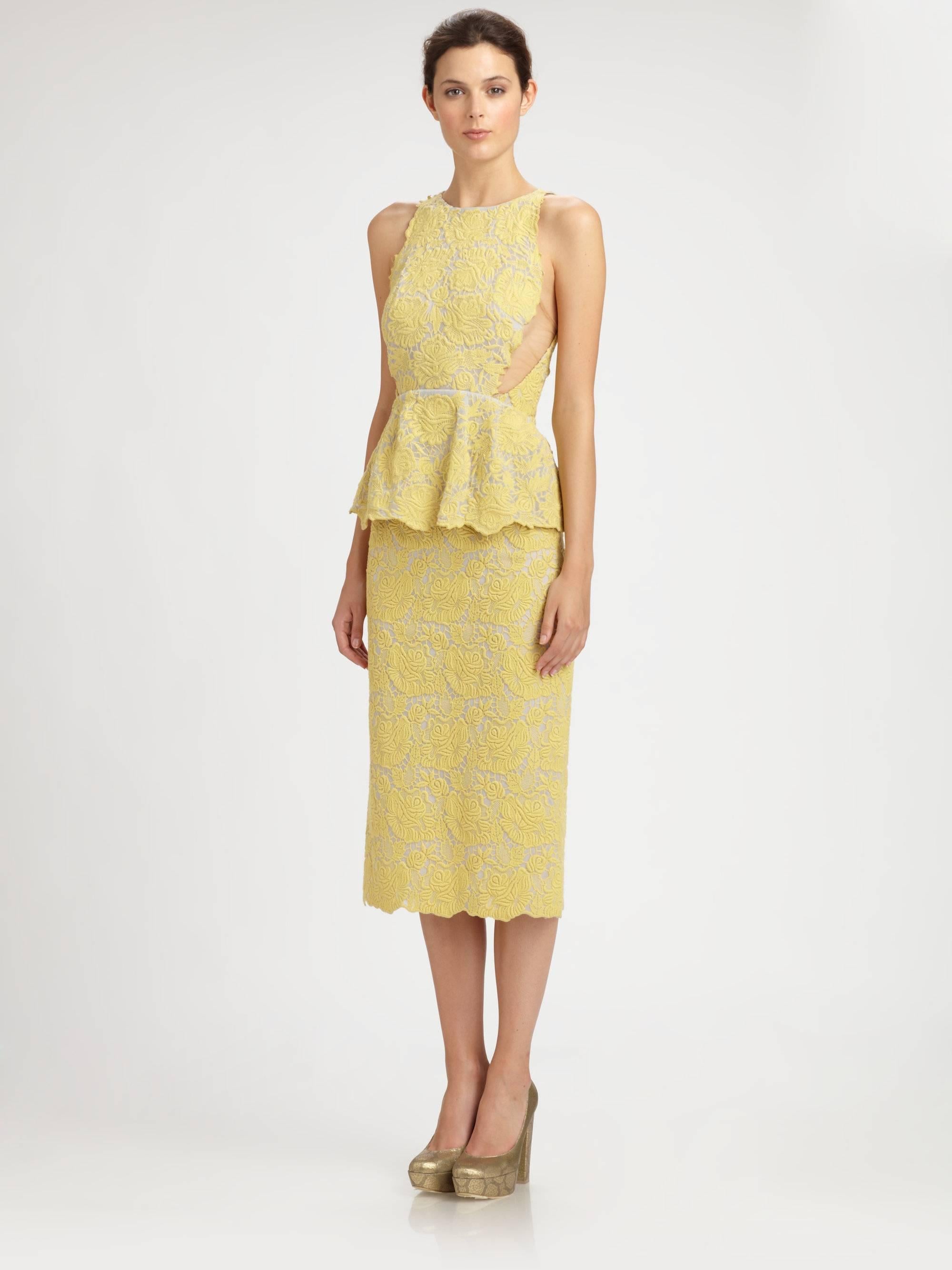 Stella McCartney Yellow Lace Peplum Cocktail Dress.  Sleeveless fitted bodice, nude mesh side panels, and fitted skirt. Centre back zipper, heavy yellow lace fabric, lined with light grey fabric. Tagged size IT 38 (USA 2 / 4).  Will fit 34