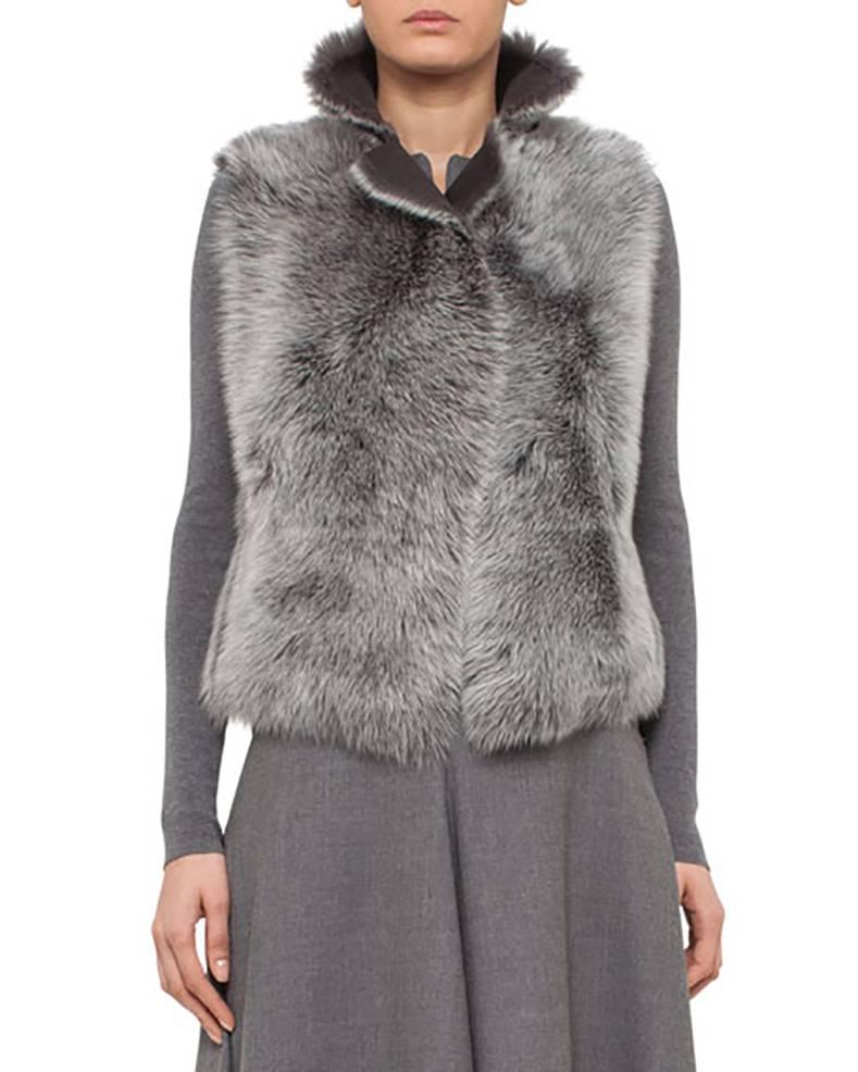 Akris Punto Grey Reversible Toscana Lambskin Shearling Fur Vest.  Sleeveless design that easily reverses and has no closures at front.  Excellent condition as new - worn once if at all. Tagged size USA 6, FR 38, IT 42.  To fit 34
