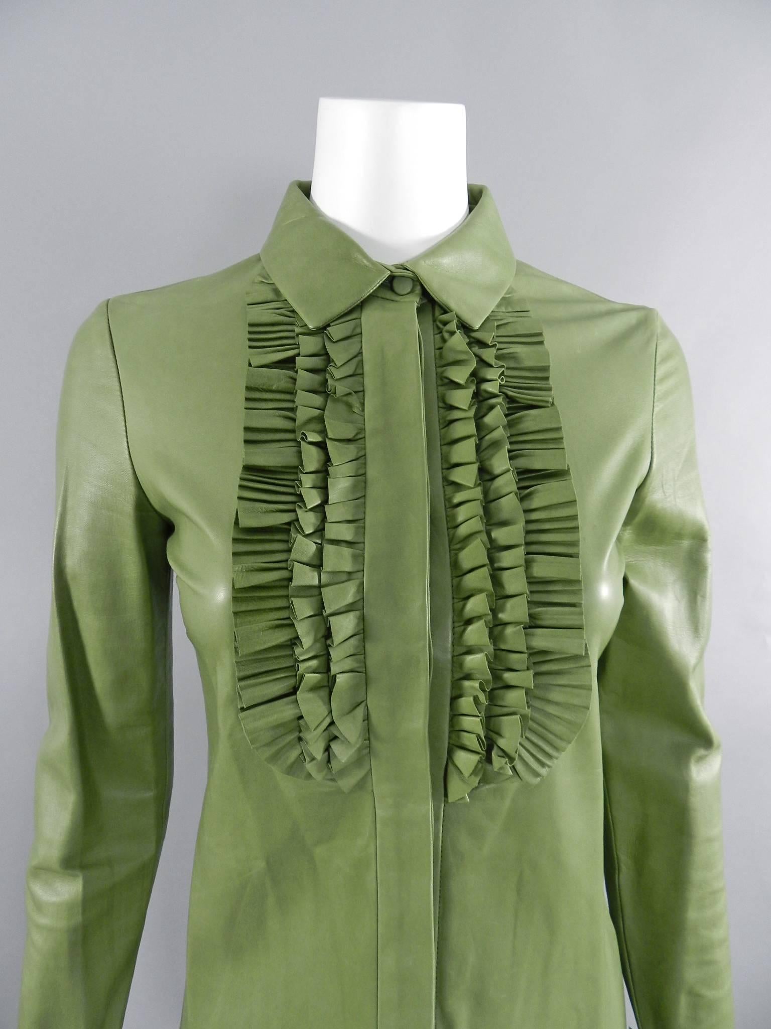 green ruffle shirt