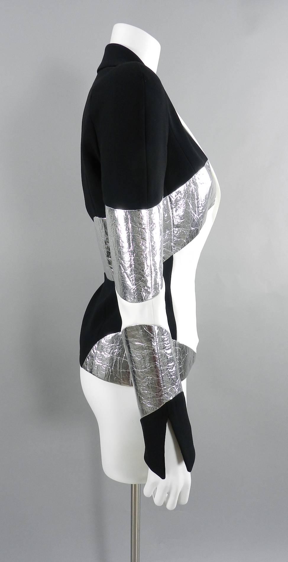 Mugler Resort 2017 Black White Silver Metallic Leather Color Block Jacket.  Signature futuristic Mugler design with rounded shoulders, french cuffs that can be worn down, and notched collar.  Fastens at front with two snaps.  Tagged size FR 36 (USA