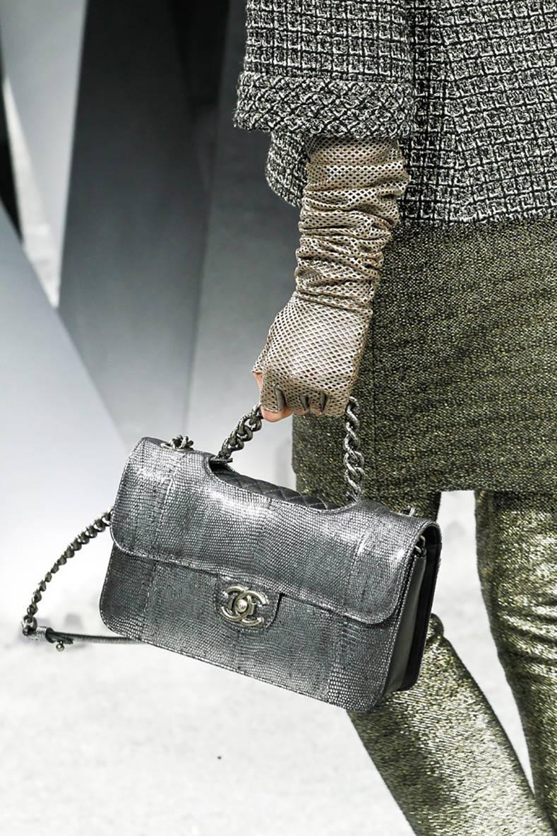 Chanel Fall 2012 Runway Silver Lizard Perfect Edge Medium Flap Bag.  Original retail $8900 CAD.  Dark antiqued gunmetal hardware, CC logo clasp, double flap interior, top chain handle and shoulder strap.  Silver metallic lizard that is designed with