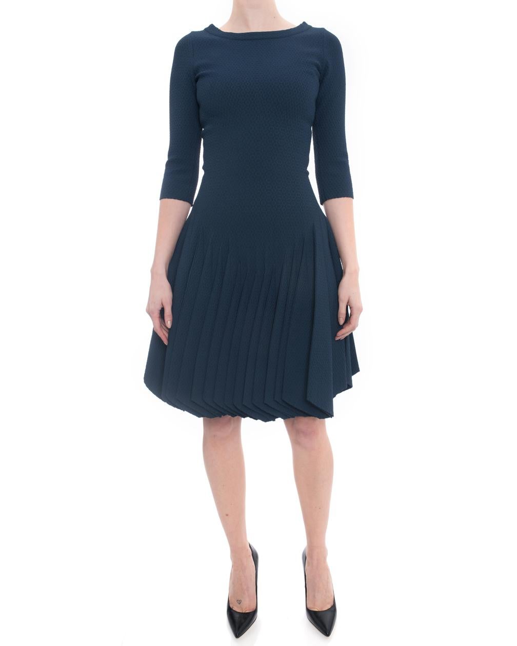 Alaia Prussian Blue Stretch Knit Fit and Flare Dress.  New with original price tag of $5795 from The Room.  Dark Prussian blue, boat neck design,  ¾ length sleeve, centre back zipper, flared skirt.  Marked size FR 38 (USA 6 but best for 4).  Please