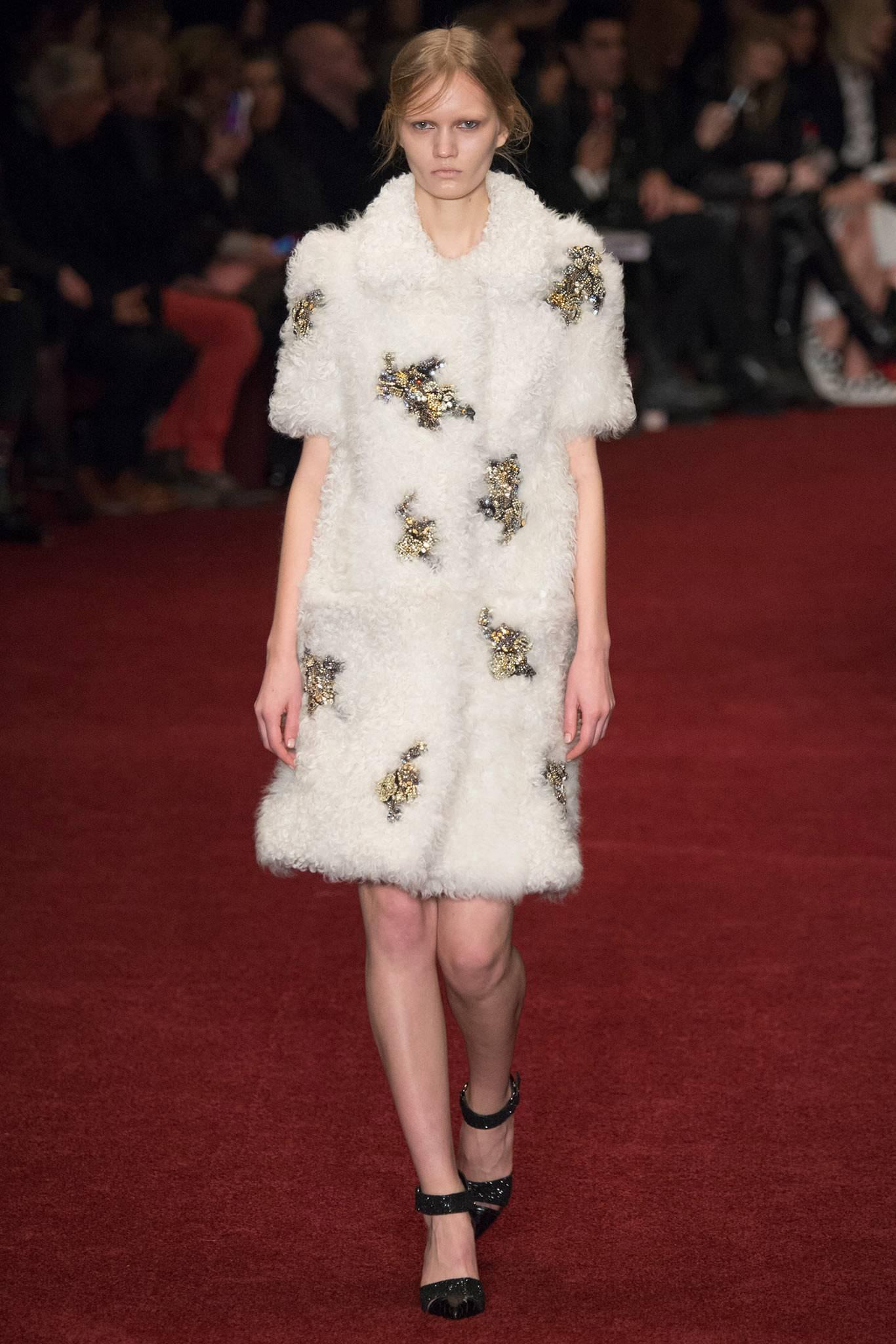 Erdem fall / winter 2014 runway shearling coat with jeweled patches. Original retail price-tag for $9430+ is in pocket. Brand new condition - worn once if at all. Signature floral interior lining. Tagged size FR 38, IT 42, USA 6. Bust to fit 34