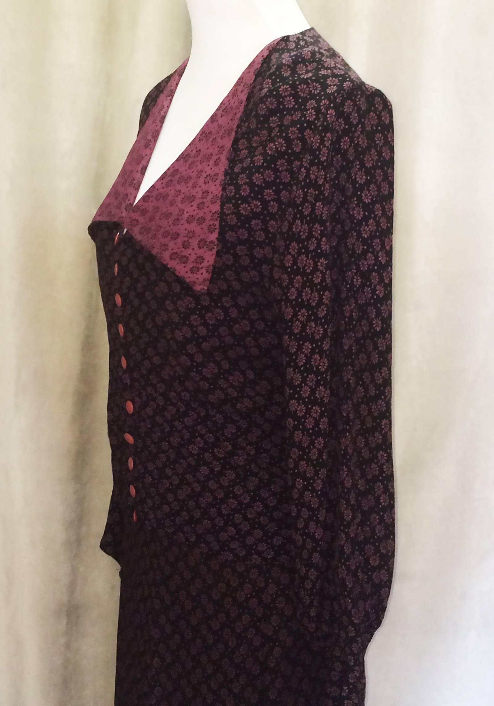 Dress, 1970’s original, 2 piece Suit by BIBA, England, in  Black and Purple floral appliques.  Amazing condition, with original metal zipper to rear skirt, and original, flat metal “hook and eye” above. Front of Jacket is complete with original 10