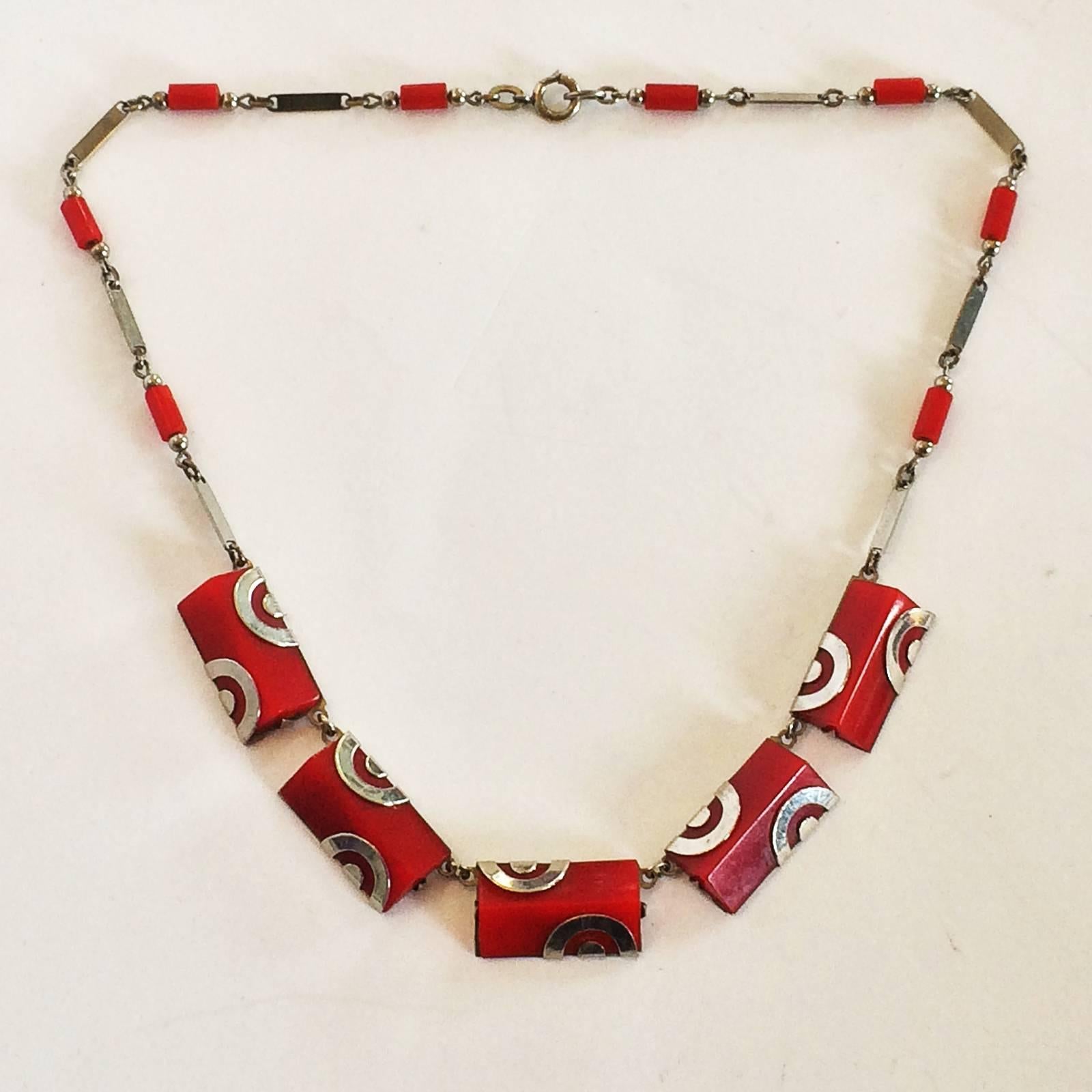 Art Deco Necklace by Jakob Bengel, with cherry red Bakelite/Galalith, set in chrome clasps and chrome clasp and chain. All in excellent condition, with no damage, losses or repairs, the clasp still working as good as new, and a lovely soft patina
