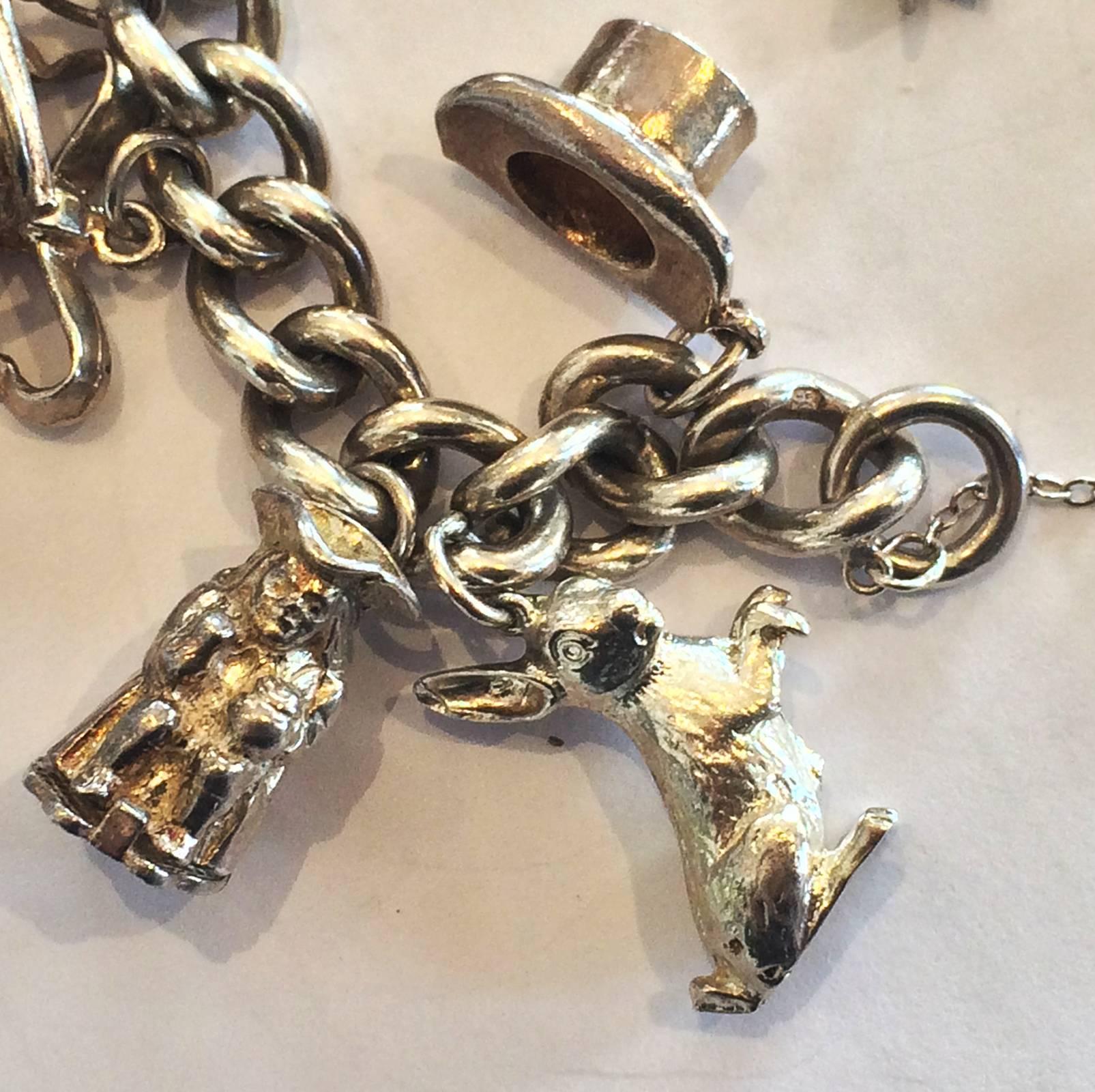 Old Lucky solid Silver Bracelet, heavy quality, Sterling Silver with 16 Lucky Charms, plus silver clasp in form of old Padlock that opens, and safety chain as well. This would be one of the best Bracelets of this type, we have seen. The lock has