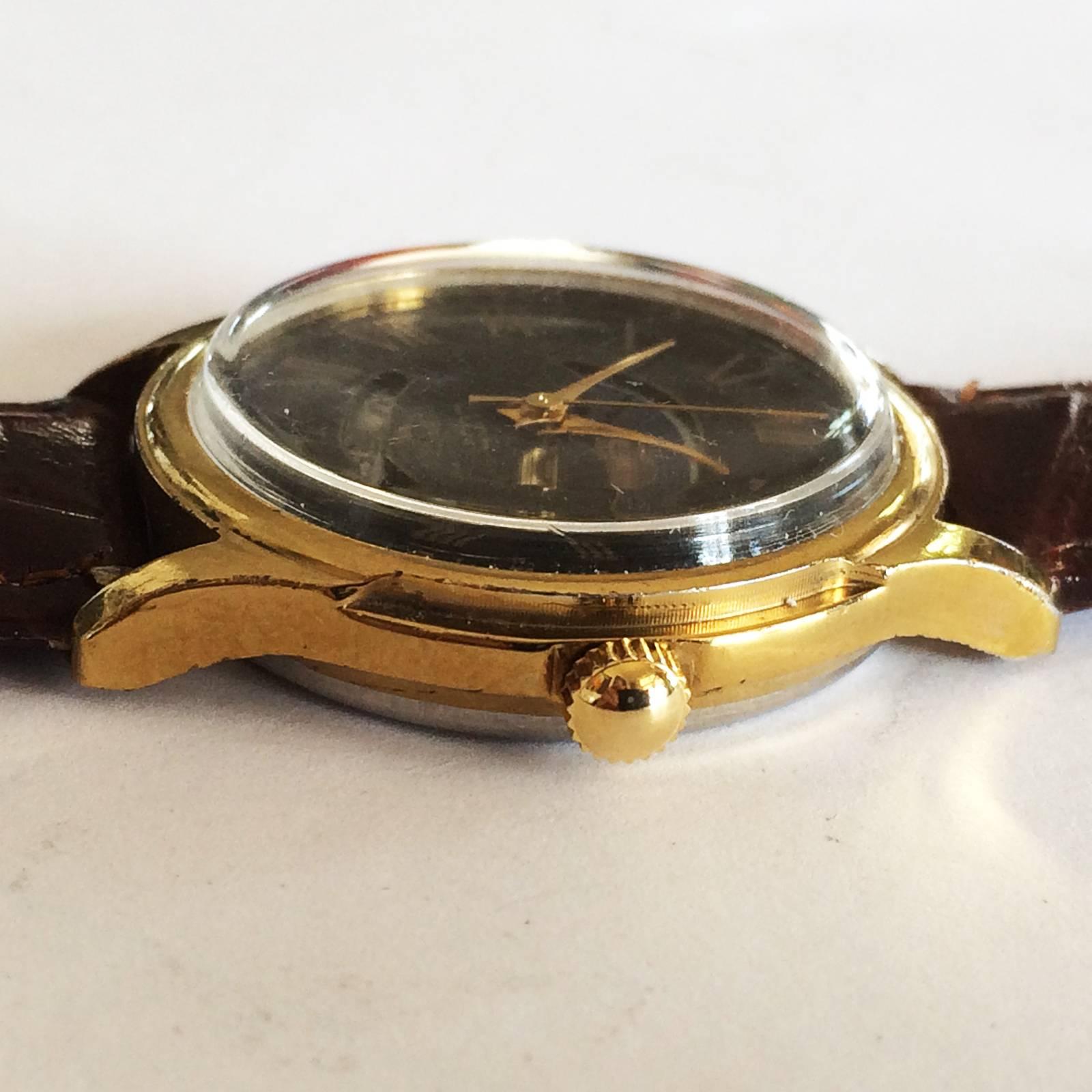 Russian Wrist Watch with Moon / Sun phase and Date, by “Luch”, “Made in Belarus” USSR / CCCP. Early Quartz movement, completely overhauled, serviced, timed and new battery by our Watchmaker and in perfect working order, with Heavy Russian gold plate