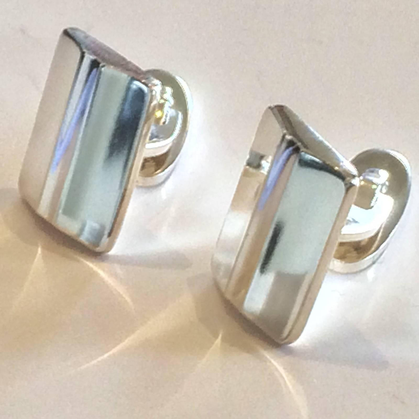 Vintage Georg Jensen Sterling Silver, Pair of Cufflinks, Design No. 125, “Modern”. Totally immaculate condition, with no damage, no scratches, losses or repairs. Post 1945 Hallmarks to rear of each piece, on the sides of the central bar, “925 S”,
