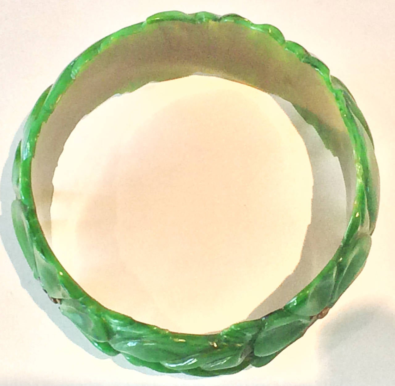 Women's Art Deco carved spinach green bakelite bangle bracelet