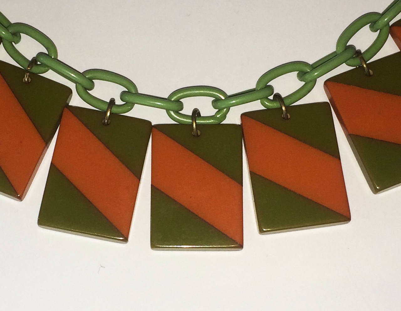 Art Deco Necklace Very rare Laminated, Geometrical Orange and Green Bakelite Rectangles on Celluloid links. Rare, fused two colour Bakelite, on continuous, interlocking celluloid chain links, all in excellent condition, including the metal clasp to