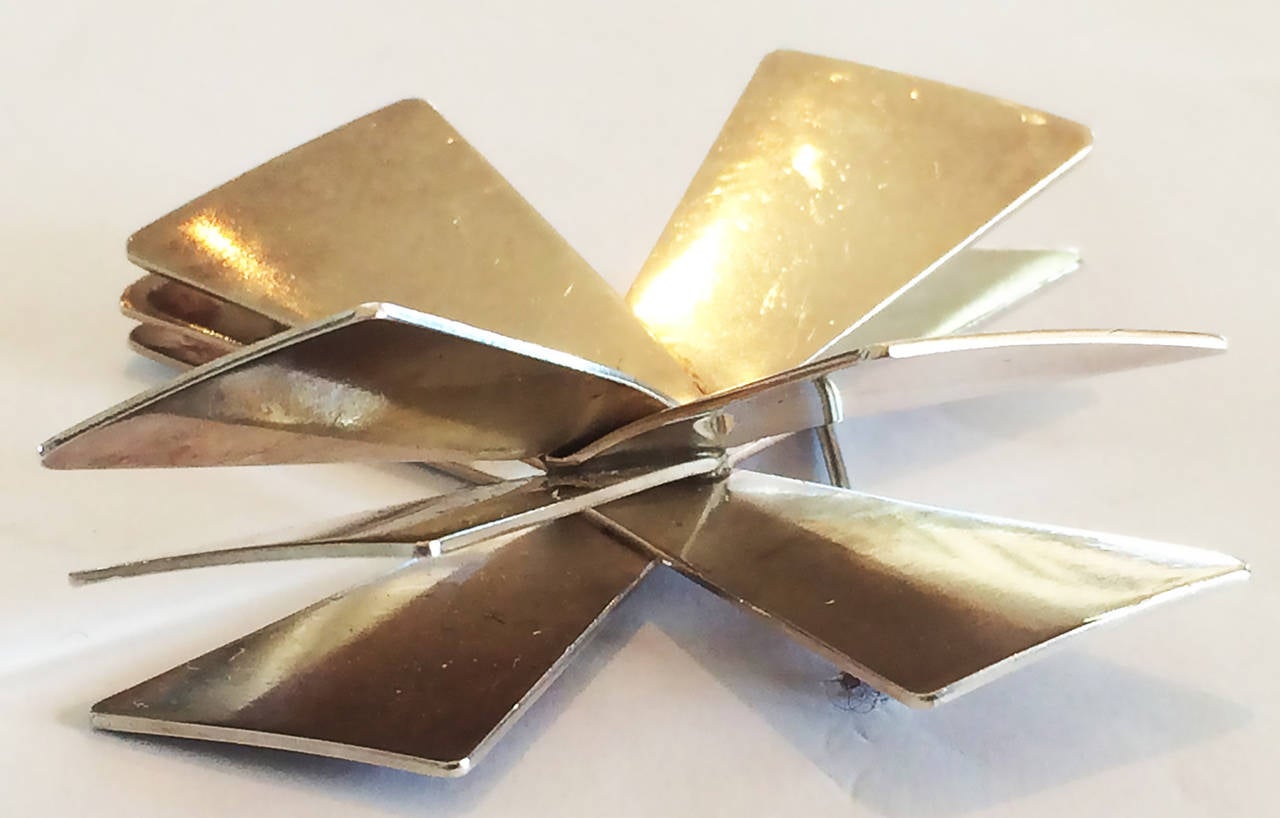 Art Deco Star brooch, Georg Jensen Brooch design by Astrid Fog. A wonderful three dimensional geometric design, featuring interlocking, angular, 5 silver plates, to create a 3 dimensional image representing a Star. Post 1945 Marks, Circa 1960. Hall