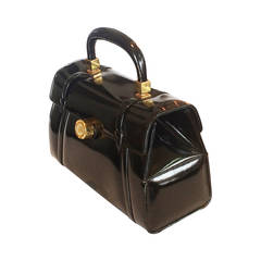 Rare Nettie Rosenstein structured solid black leather purse with watch