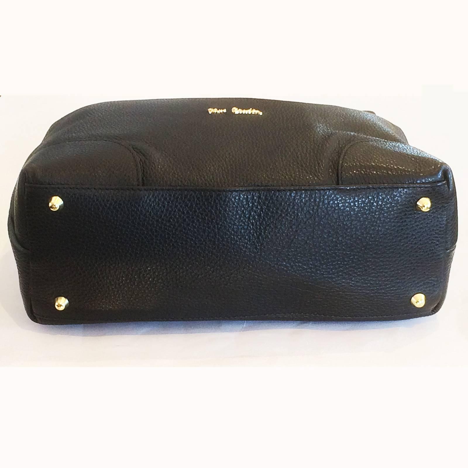 Pierre Cardin Handbag in Black Caviar pattern Leather. Fitted Internally with a slip Pocket to one side, zipped pocket to other, and larger, full width zip to top of bag, Cylinder finger grip to zip end, all in gilt finish, including Script name to