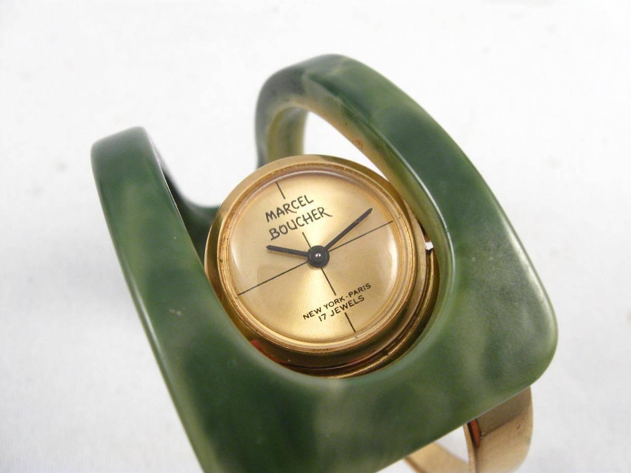 Art Deco /Mid Century, Marbled Green Bakelite and Gold tone Clamper Wrist Watch. All in excellent condition, negligible wear, nearly as new, including the rear of the watch and the face is immaculate. Keeping good time for age, checked, cleaned and