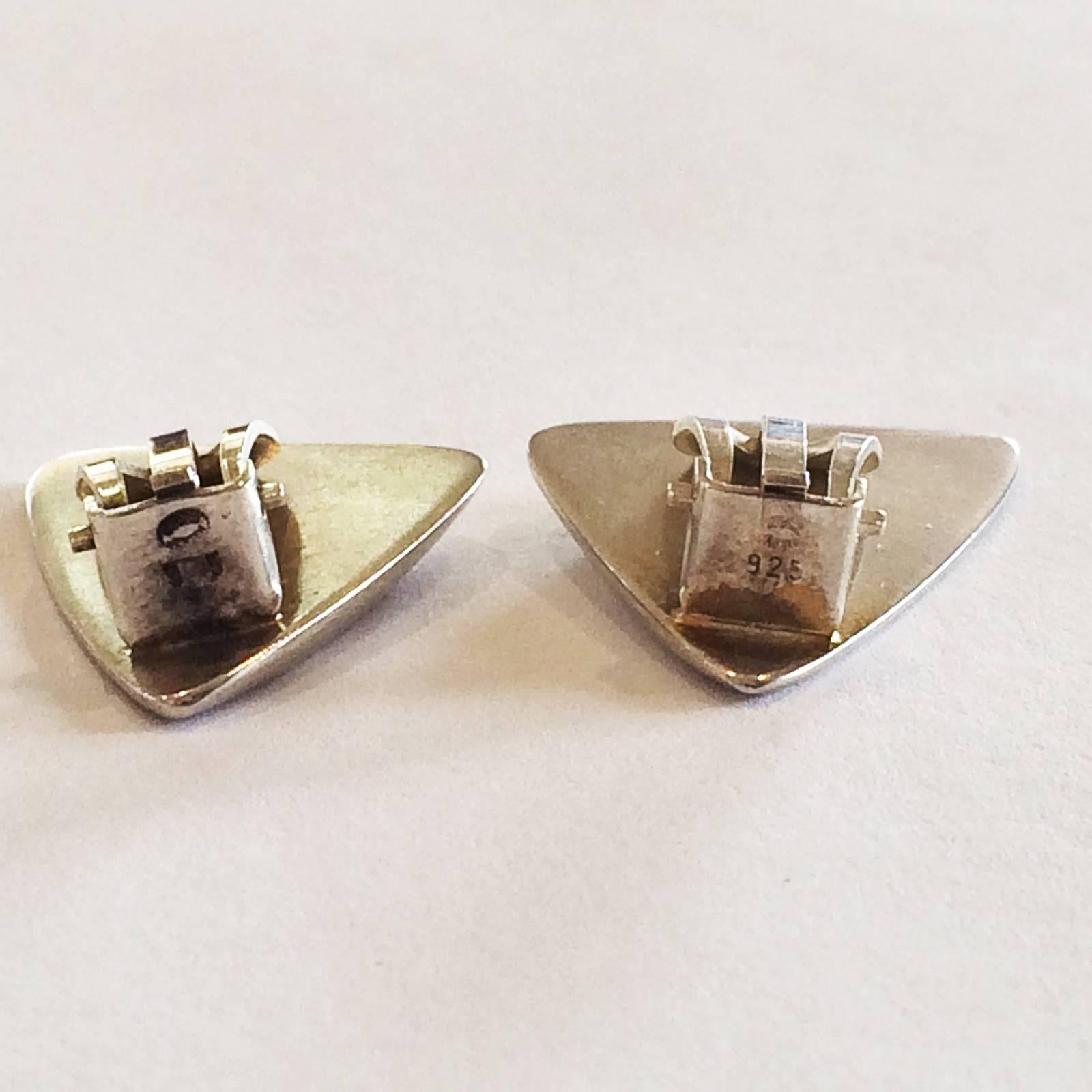 Earrings by Georg Jensen, designed by Bent Gabrielsen; an early, classic design, recognised as “The Triangles” or “Peak” Design. All in Sterling Silver and Hallmarked to the rear, “925”, being the European Sterling Mark, over the standard “Georg”