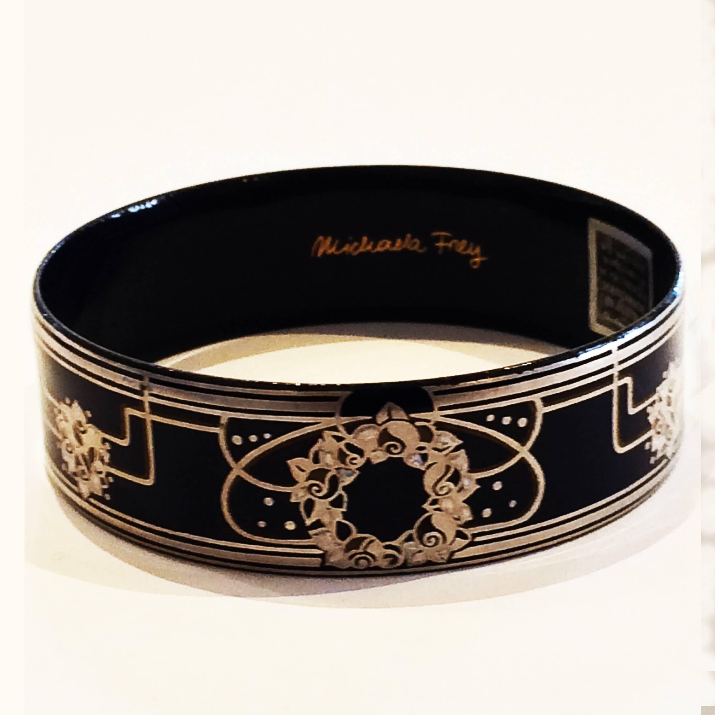 Mid Century, Bangle, Fine Silver Inlaid by Michaela Frey. A delicate design in Florals, with Silver banding, loops and dots with an Art Nouveau Influence. All in perfect condition, still retaining the original Manufacturer sticker to the inside