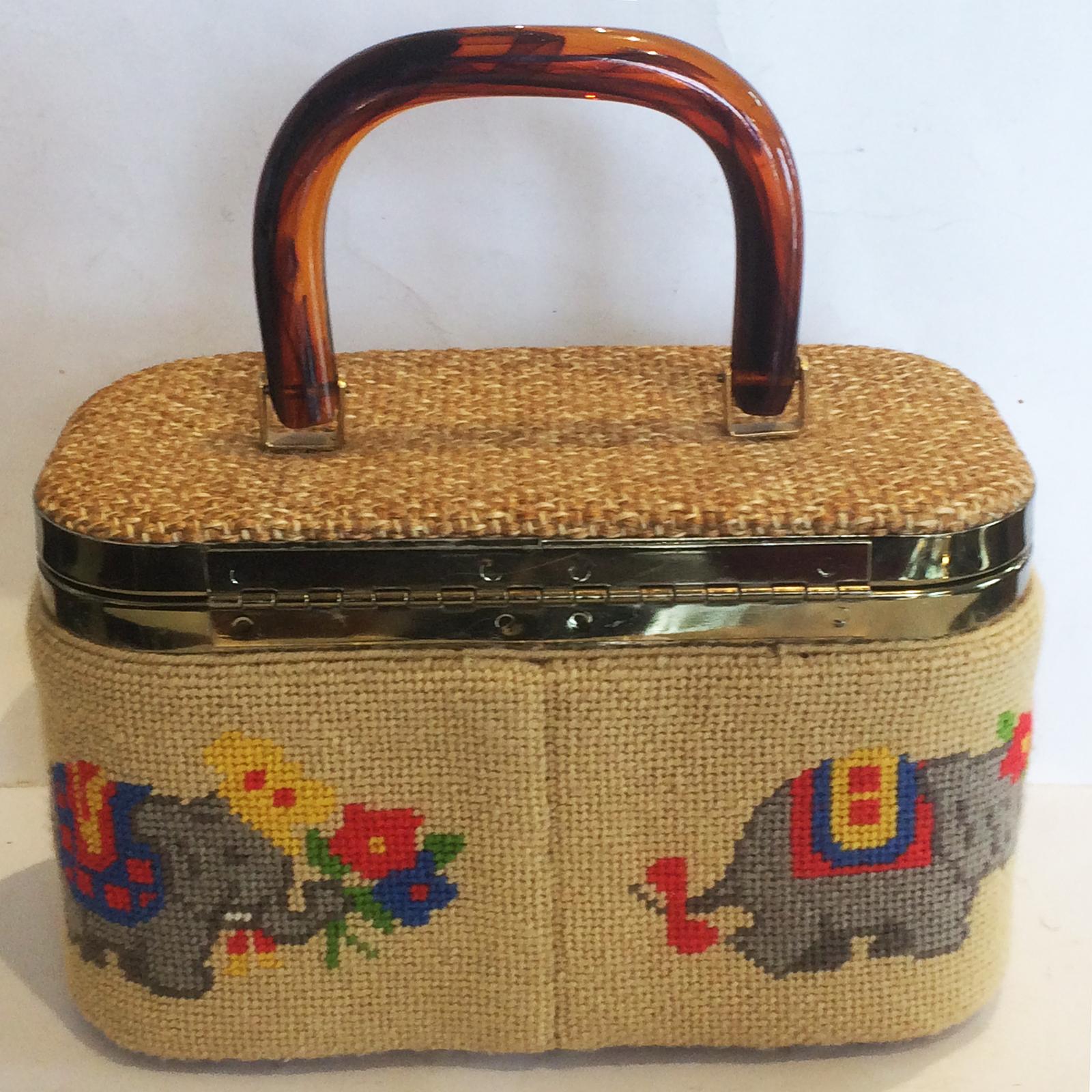 Mid Century Box Handbag with Tapestry Elephants and swirled Honey Lucite Handle, still in perfect condition, as to all the gilt fittings. The exterior is nearly “as New”, other than slight loss of gilt to lower support studs which the Handbag rests