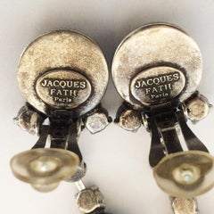 A Pair of Mid Century Onyx and Diamante earrngs by Jaques Fath