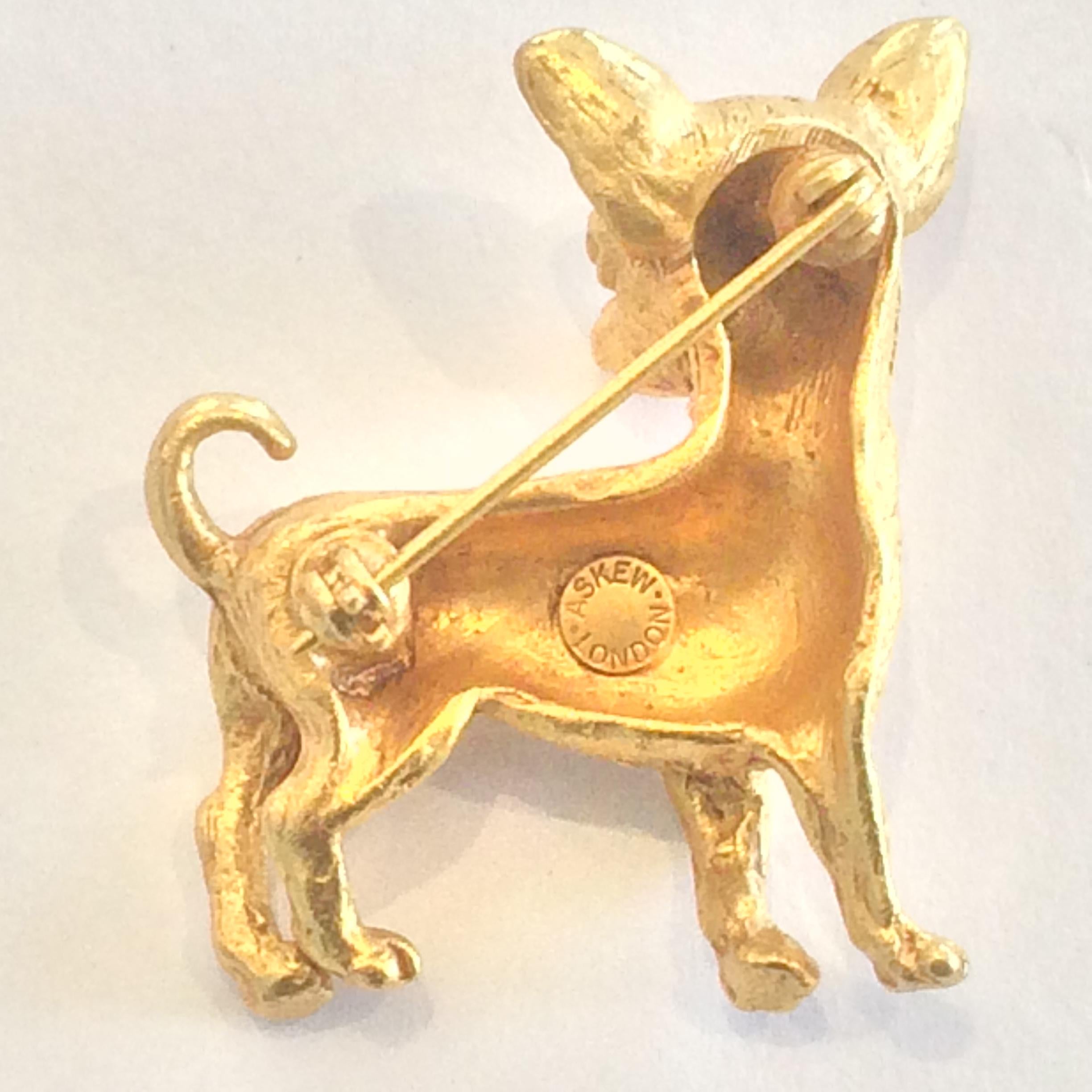 Askew of London very Heavy Gold Plate Chihuahua Brooch in mint condition, no wear, no damage or repairs. Intense 3 dimensional detail and high quality manufacture from an Internationally renowned Jeweller. The original Manufacturer’s lozenge is on