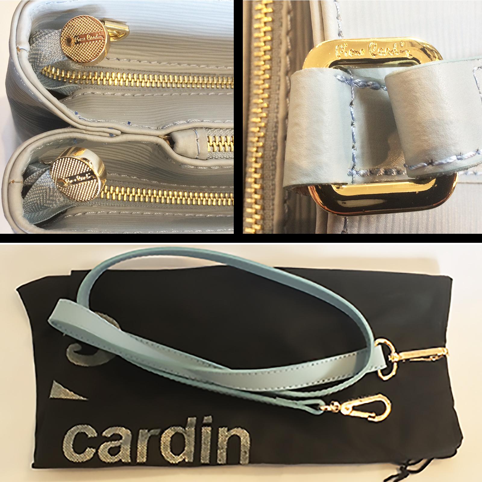 Pierre Cardin New Old Stock Handbag in Powder Blue Leather. Never been used, still with the untouched Dust bag, separate shoulder strap, etc.. The Bag front is imprinted in script to the front, “Pierre Cardin” and also to all metal components. There